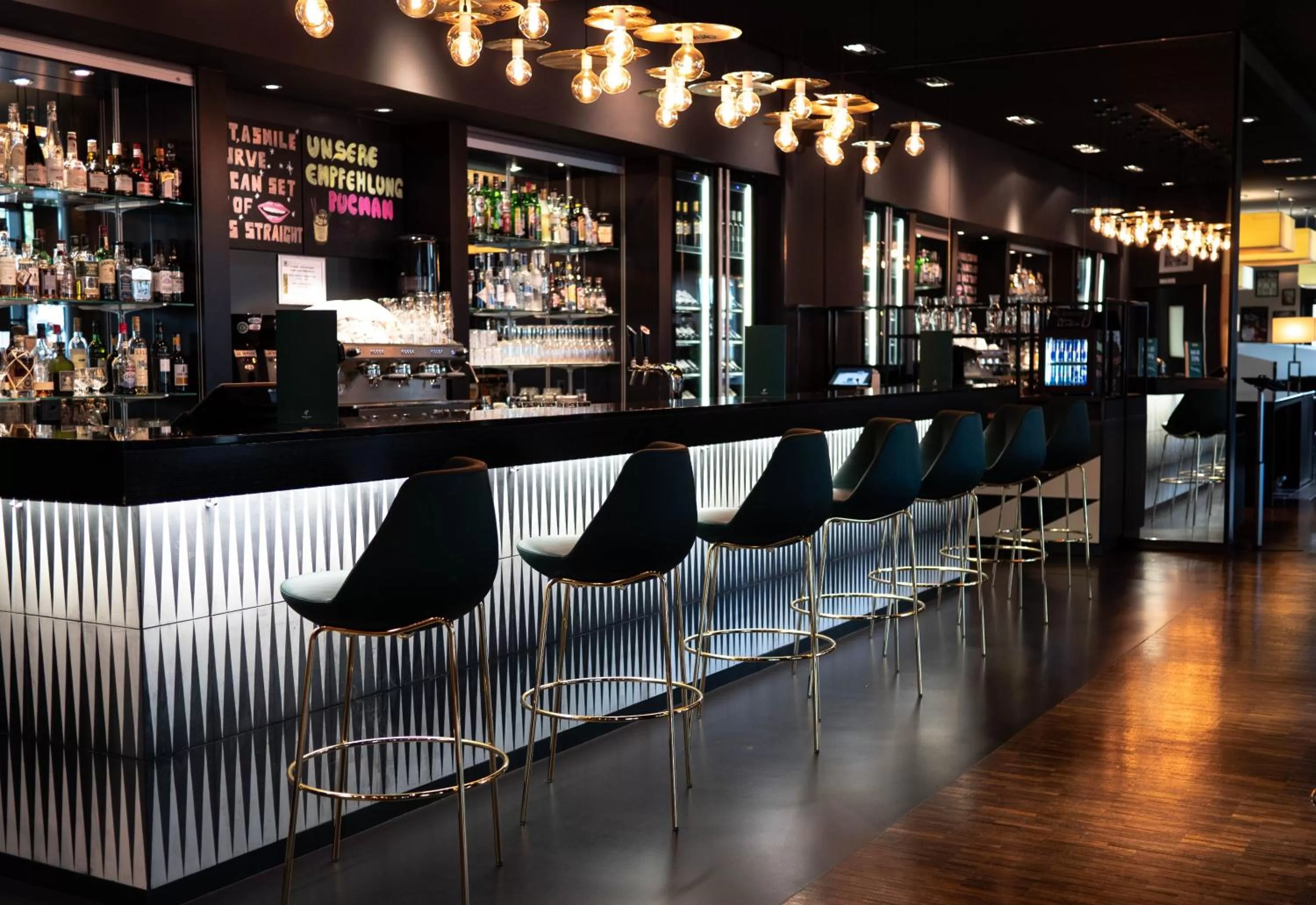 Lounge or bar in Holiday Inn Zürich Messe by IHG