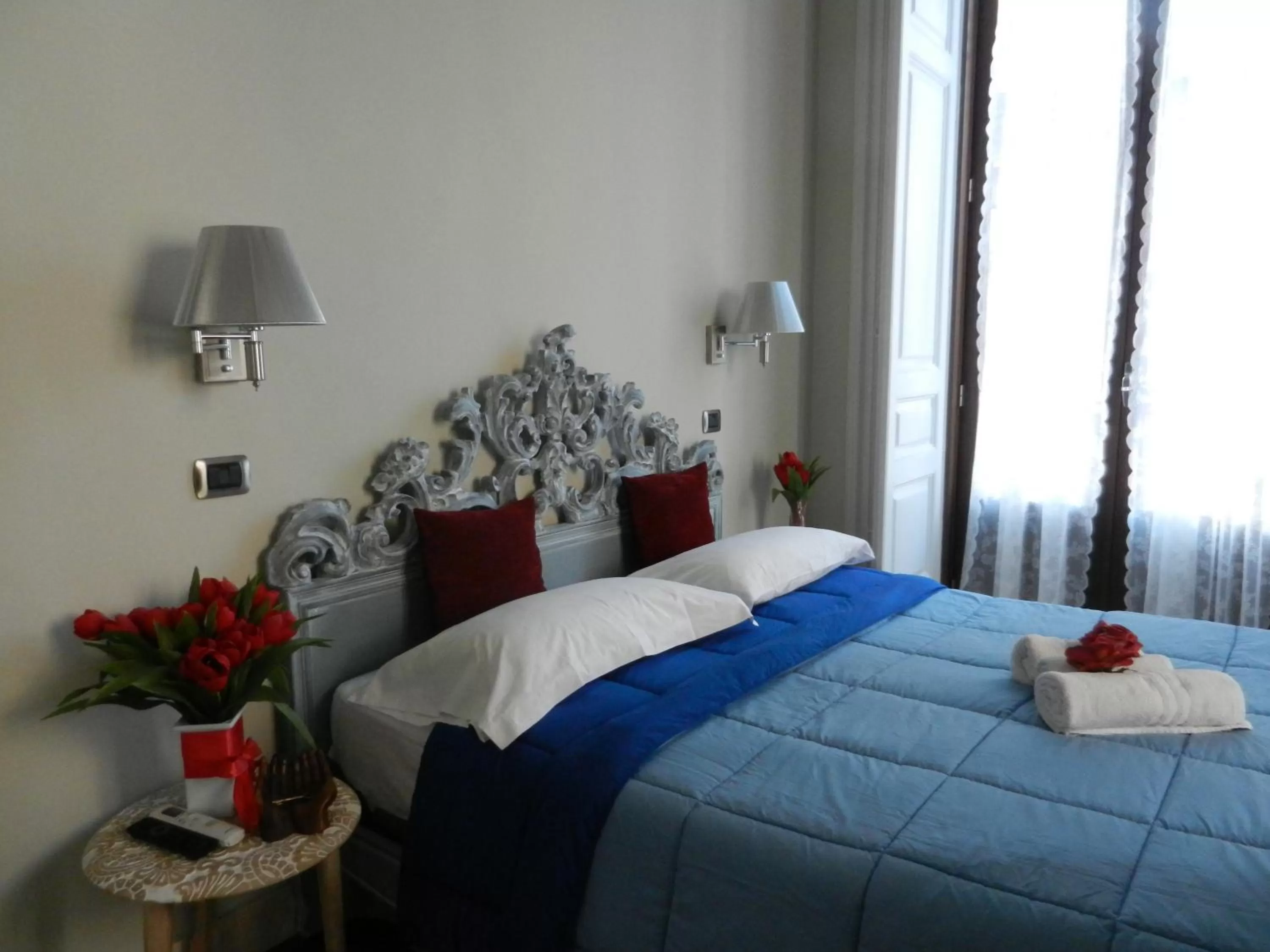 Bed in RossoCorallo B&B