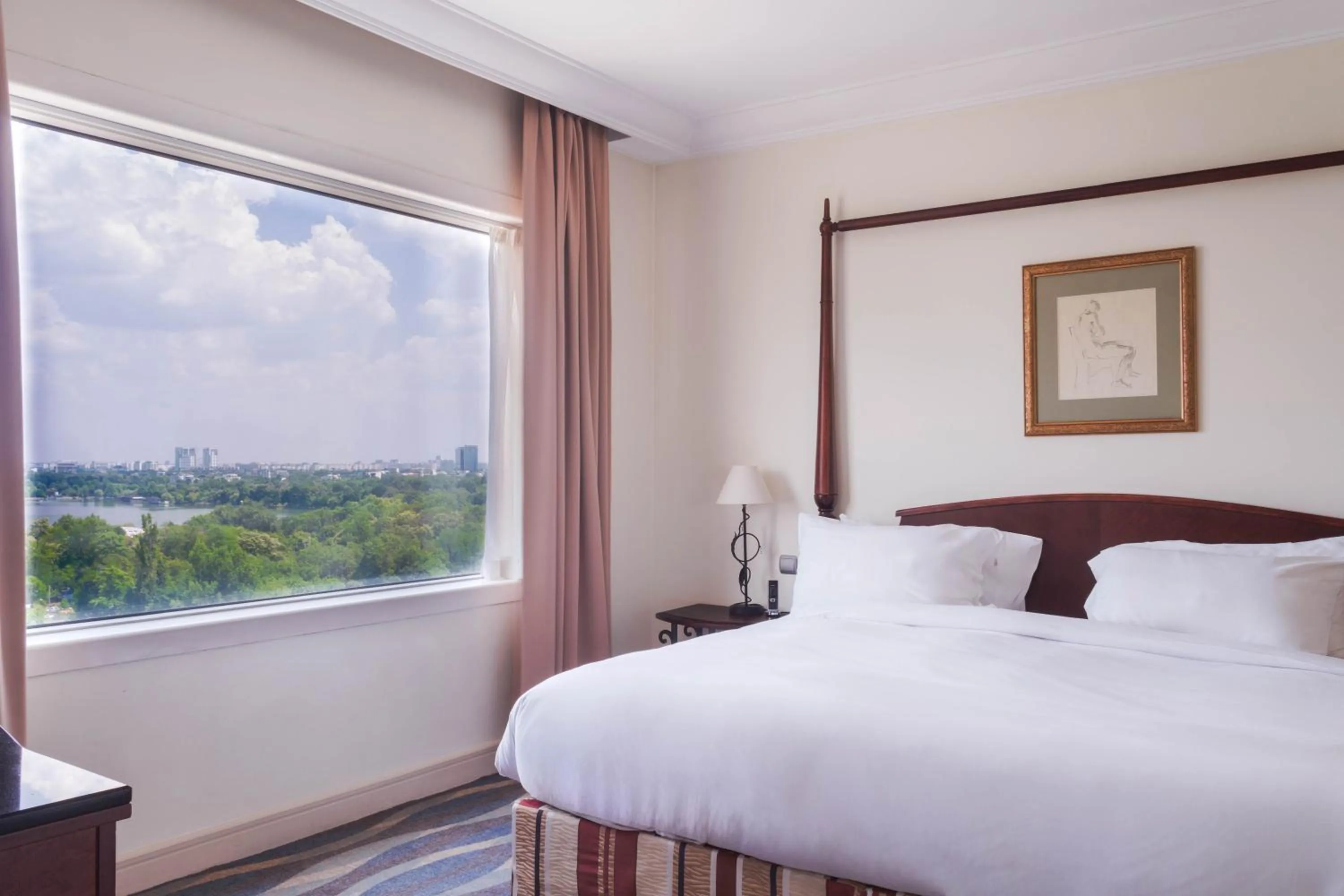 Bed in Pullman Bucharest World Trade Center