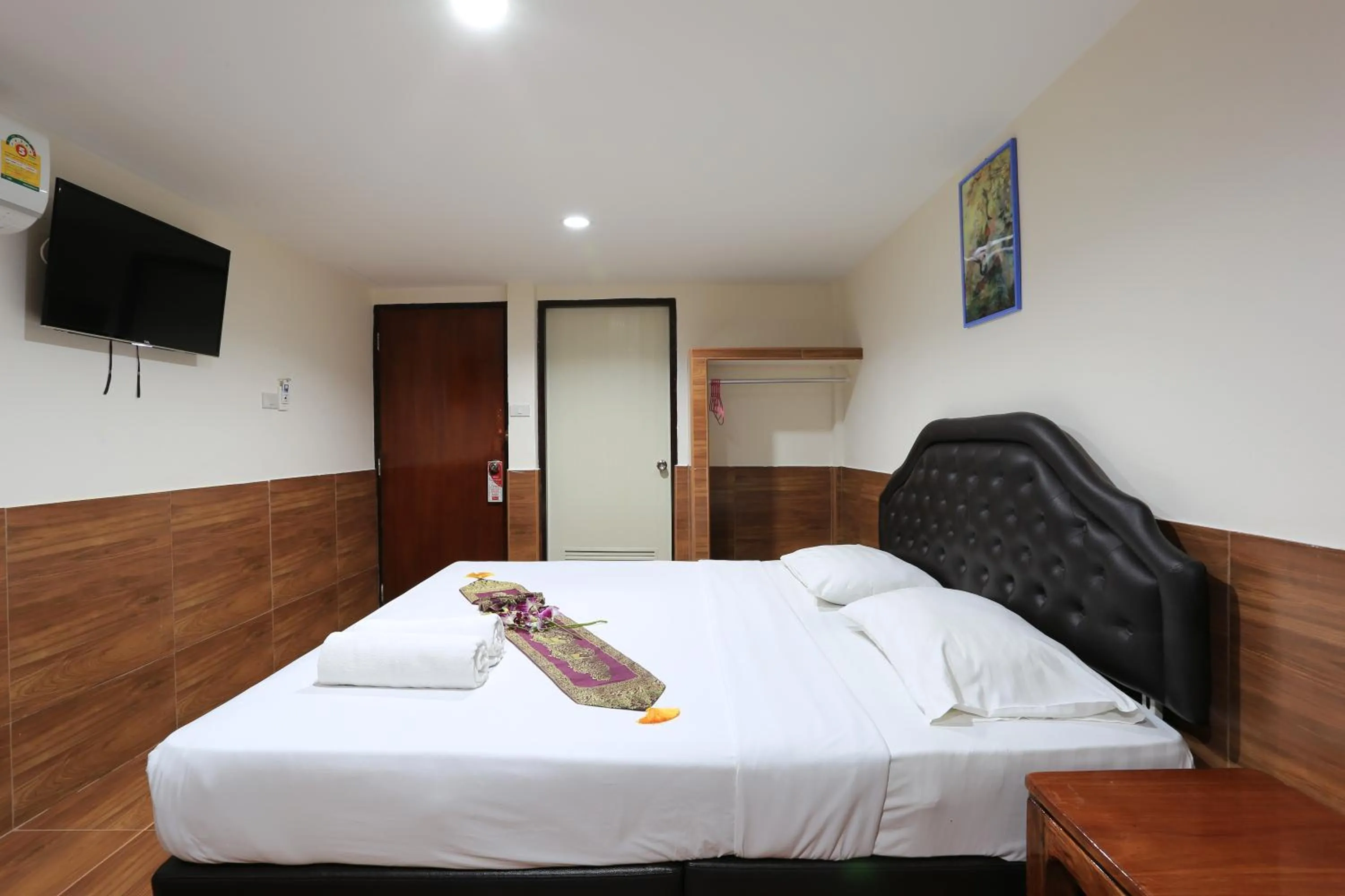 Bed in The Siam Guest House - SHA Extra Plus