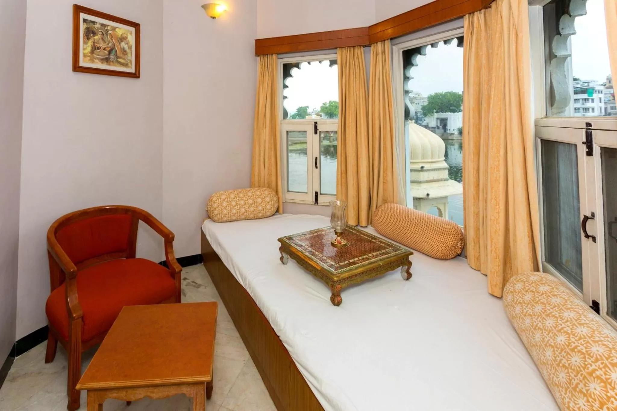 Seating area, Bed in Sarovar - Lake Facing Boutique Hotel On Lake Pichola