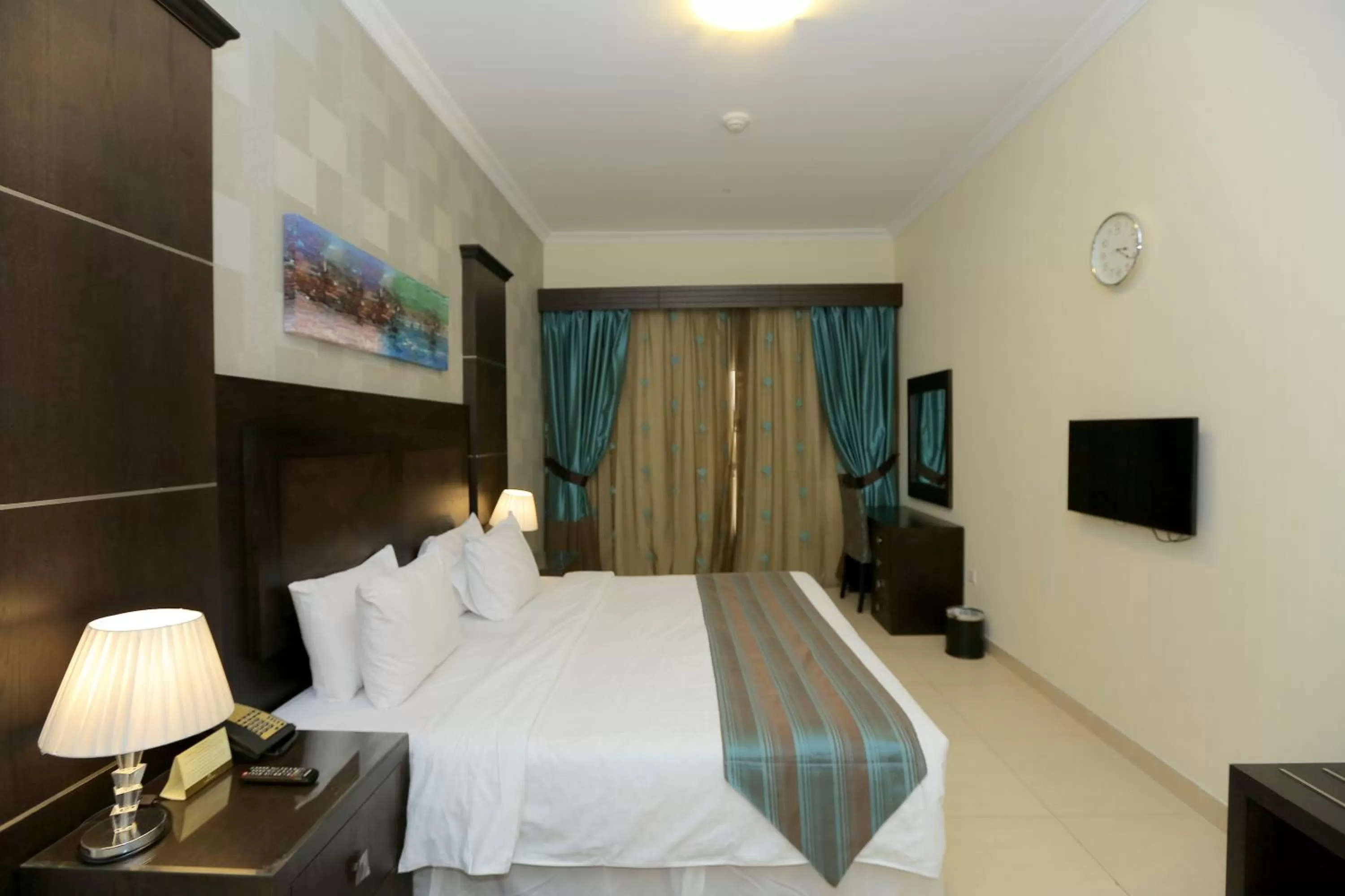 Bed in Ivory Grand Hotel Apartments