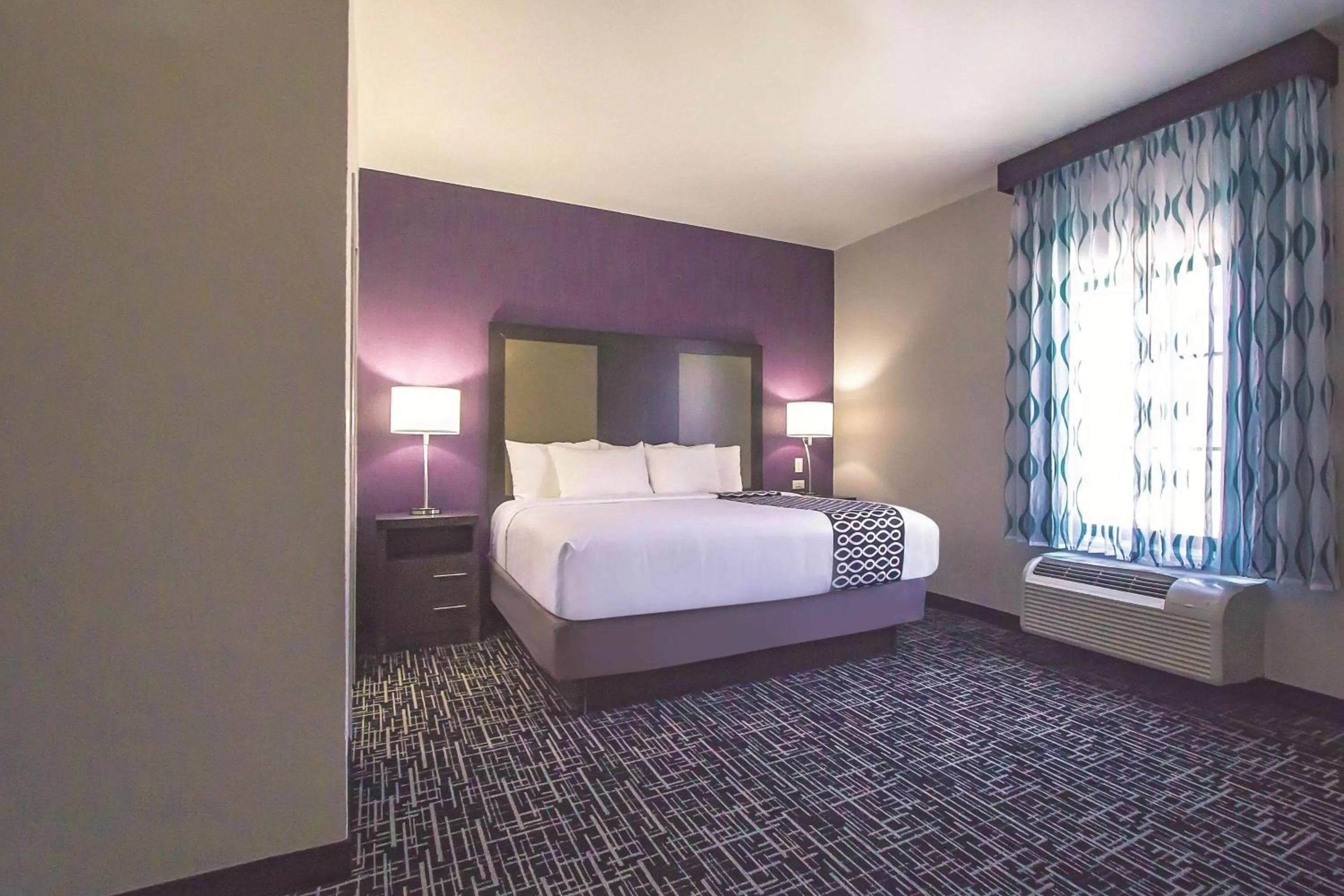 Photo of the whole room, Bed in La Quinta by Wyndham Pampa