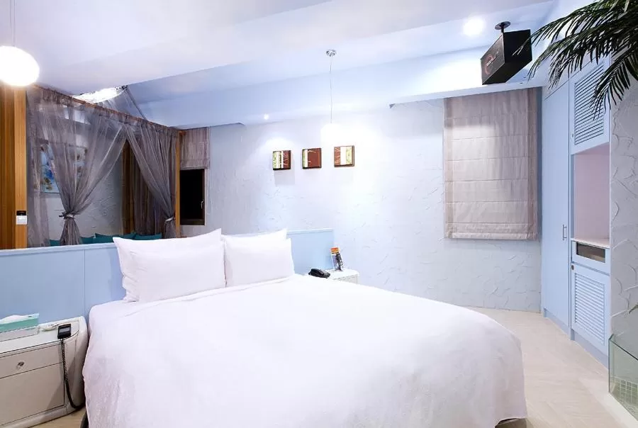 Photo of the whole room, Bed in Discovery Motel - Yanping