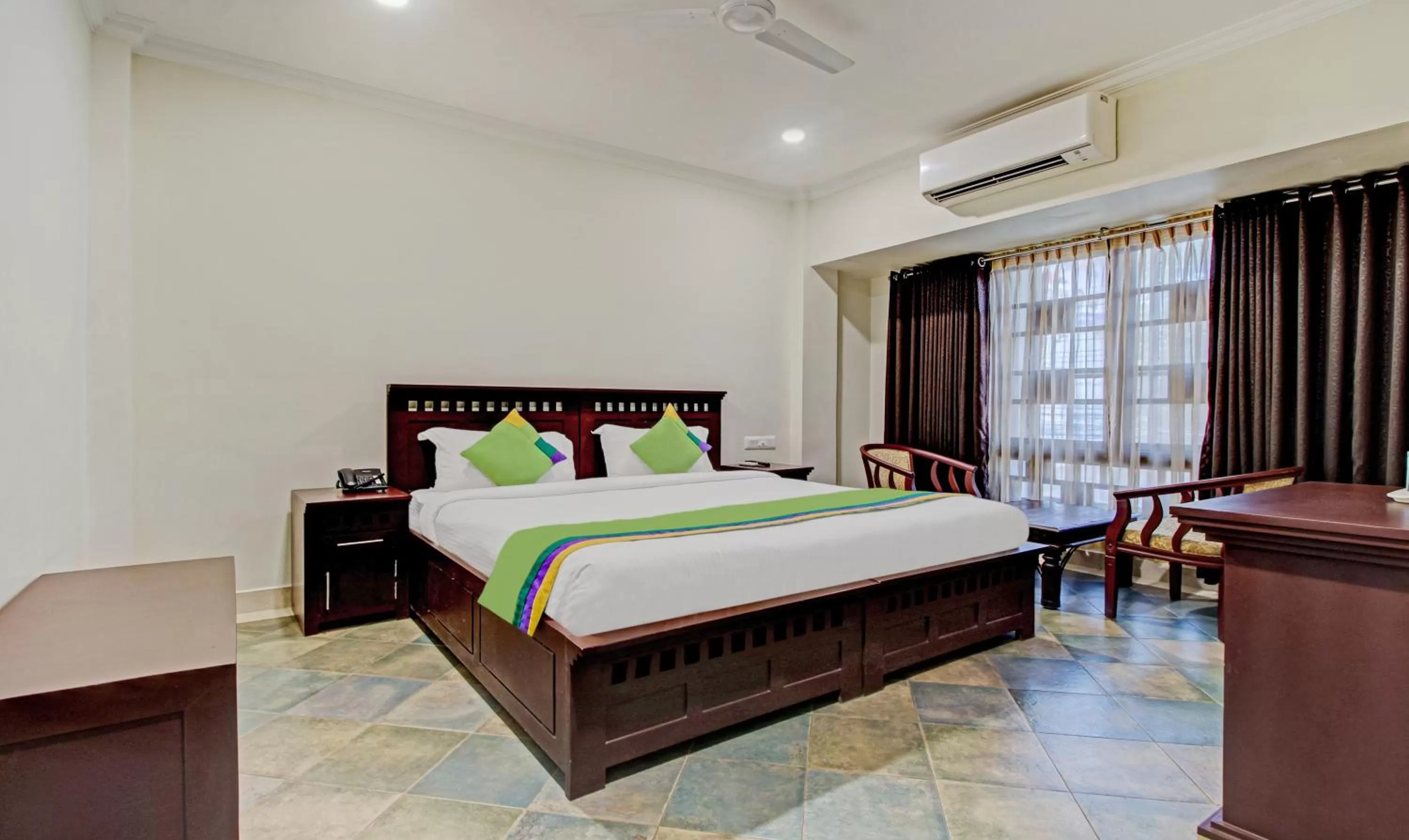 Bedroom, Bed in Treebo Prince