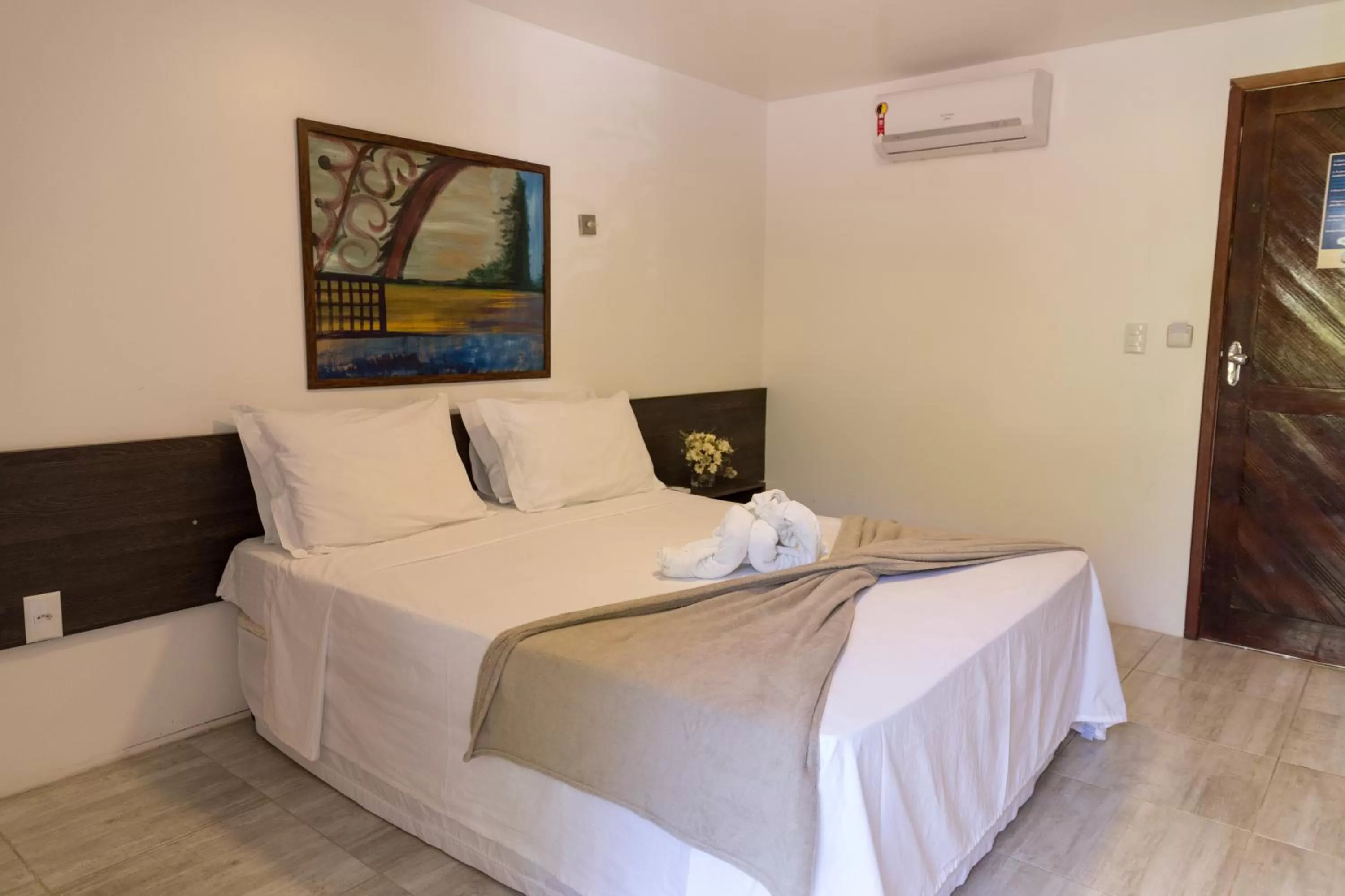 Bed in Pousada Sol e Mar