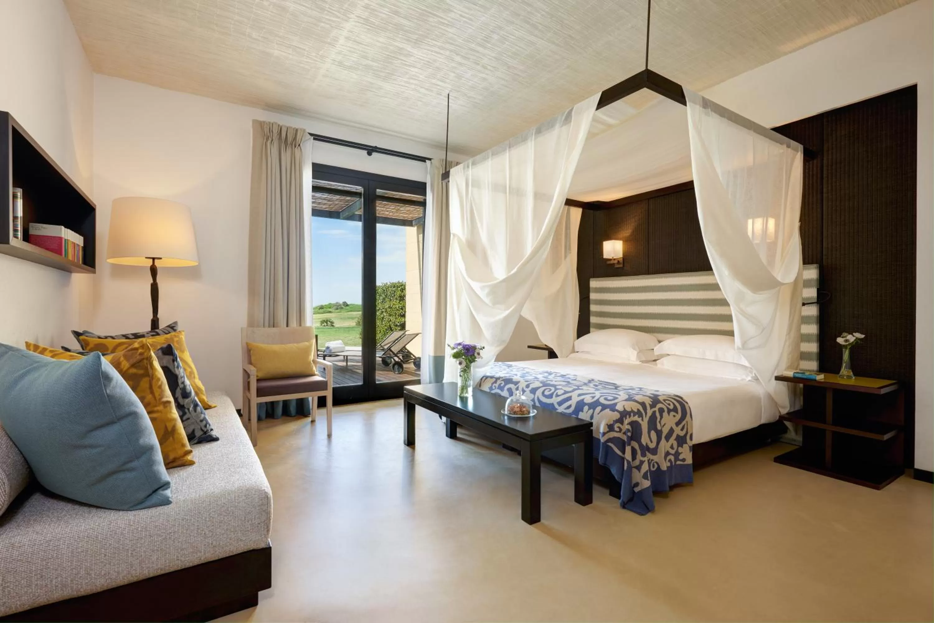 Seating area, Bed in Verdura Resort