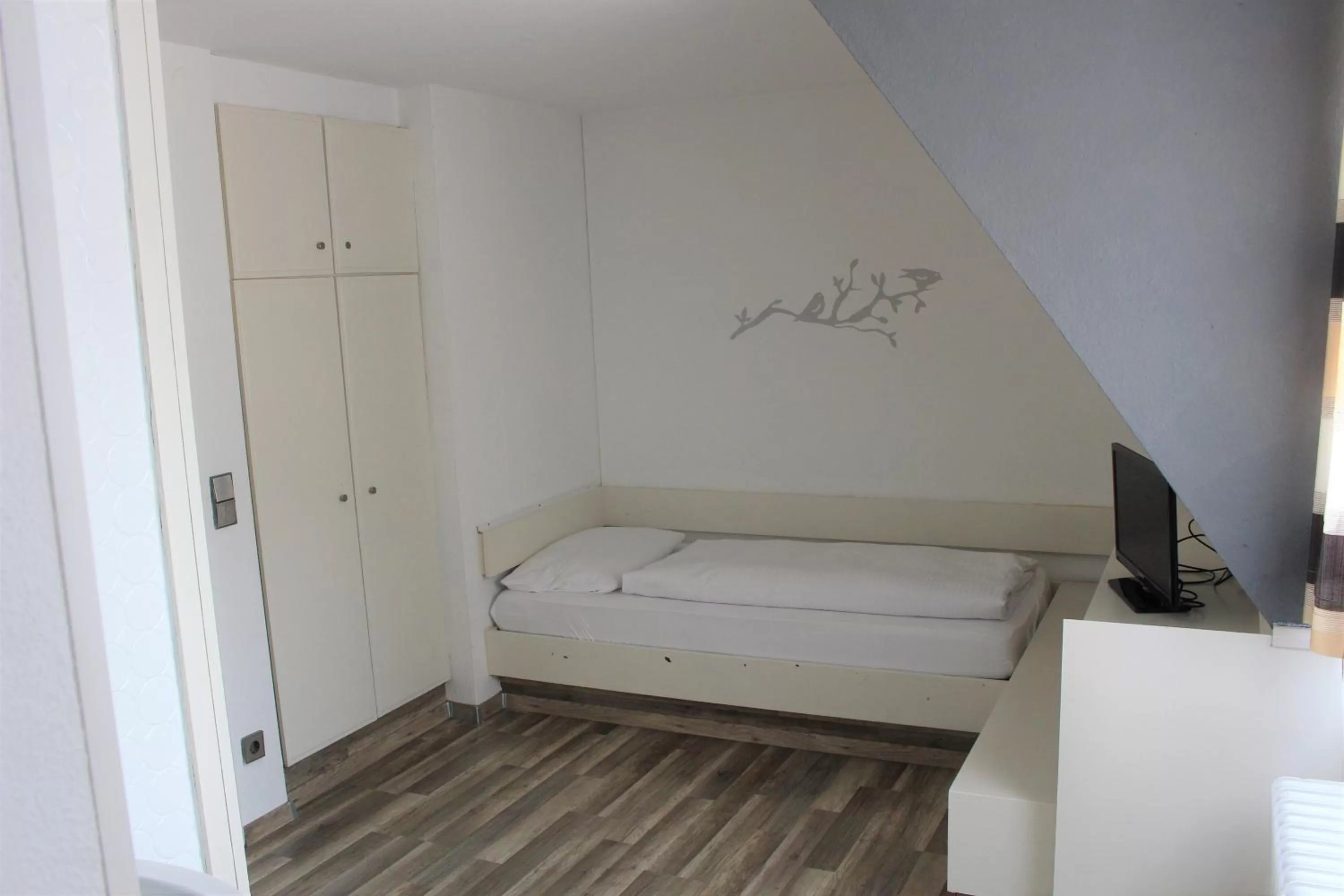 Bed in Hotel Ulmer Spatz