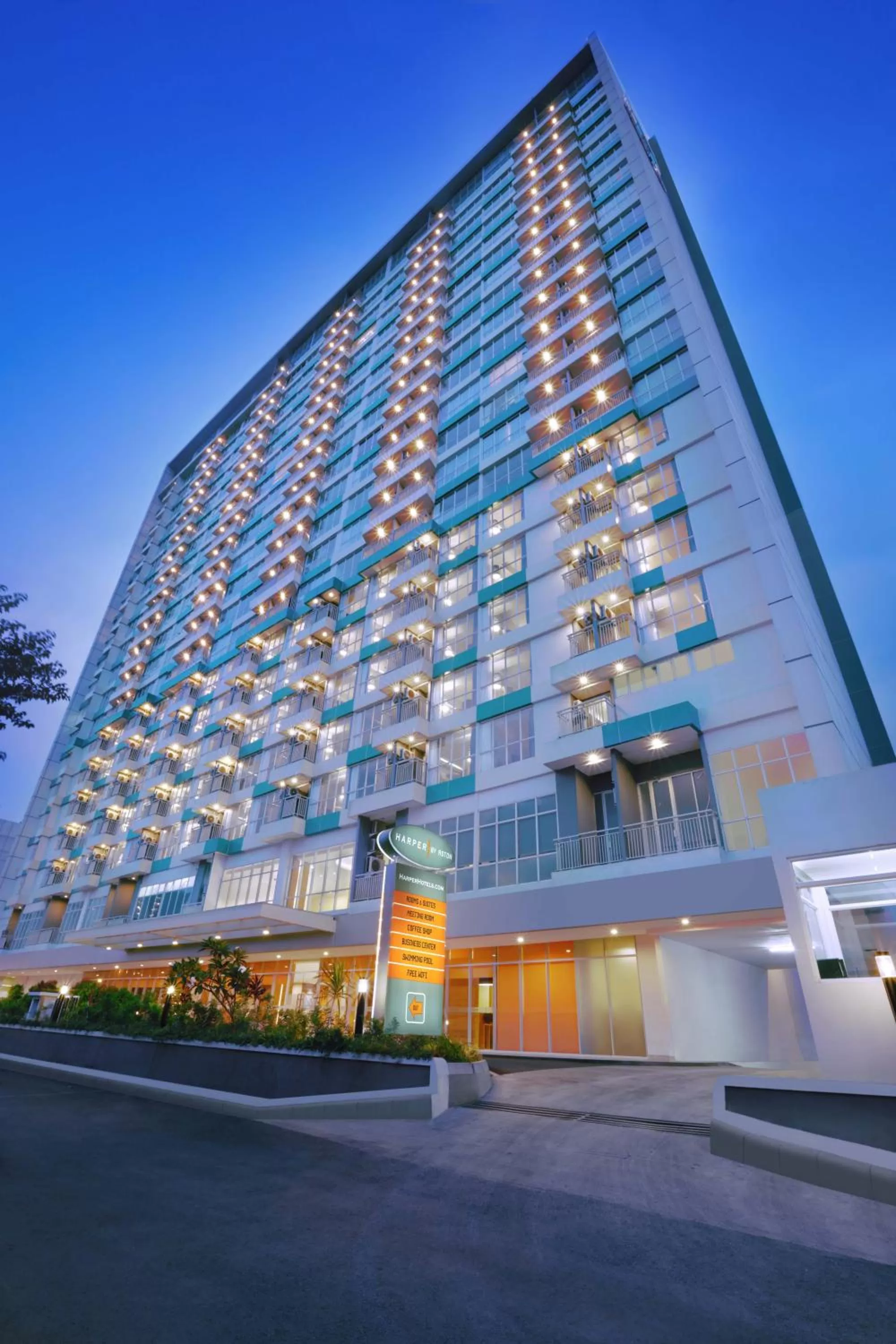 Facade/entrance in Harper MT Haryono by ASTON