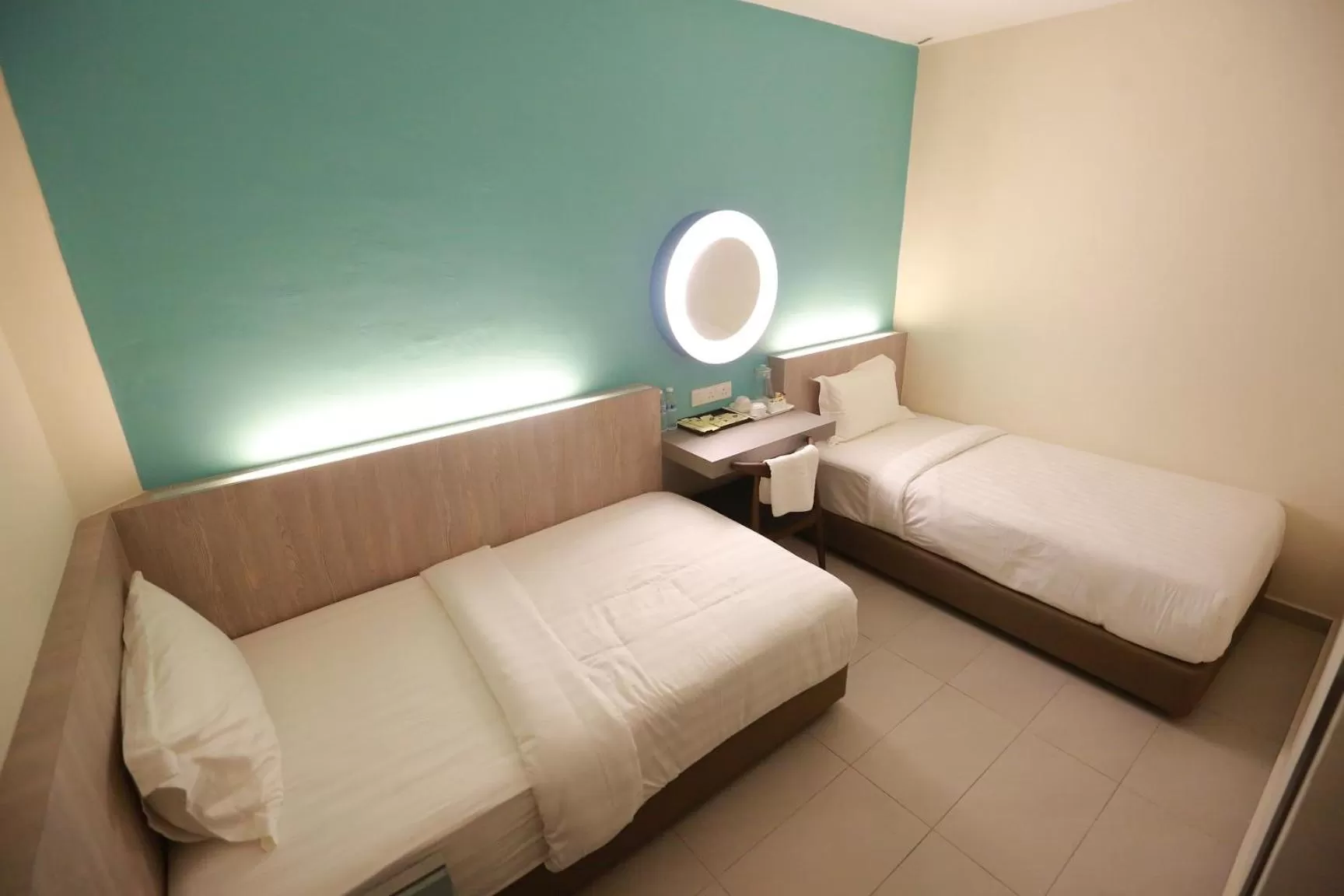 Bed in Pantai Regal Boutique Hotel