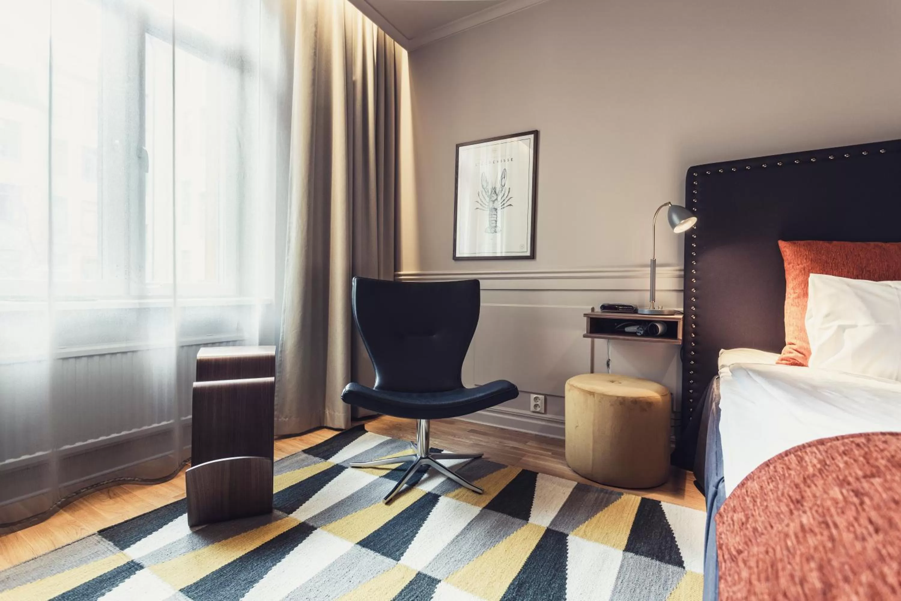 Seating area, Bed in Hotel Poseidon