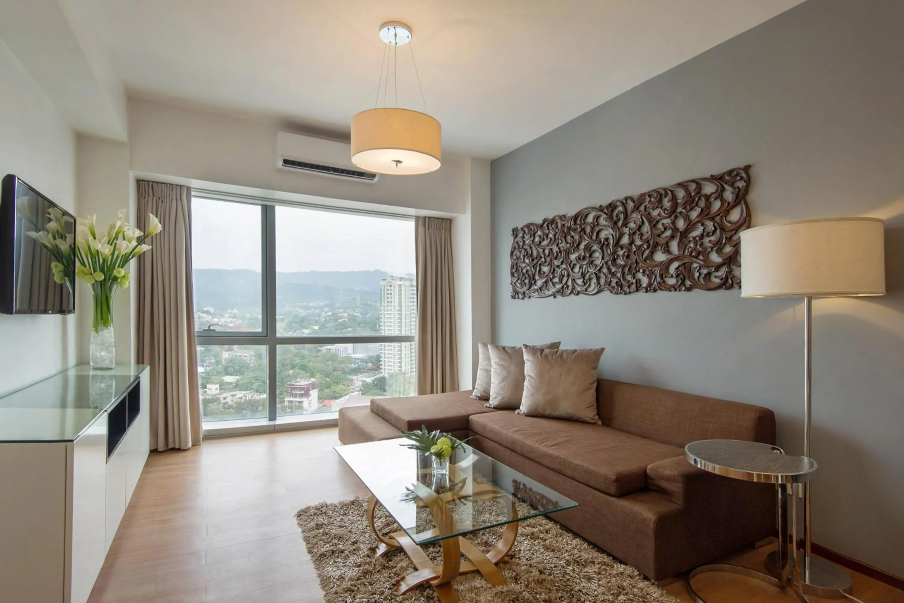 Communal lounge/ TV room in Quest Serviced Residences