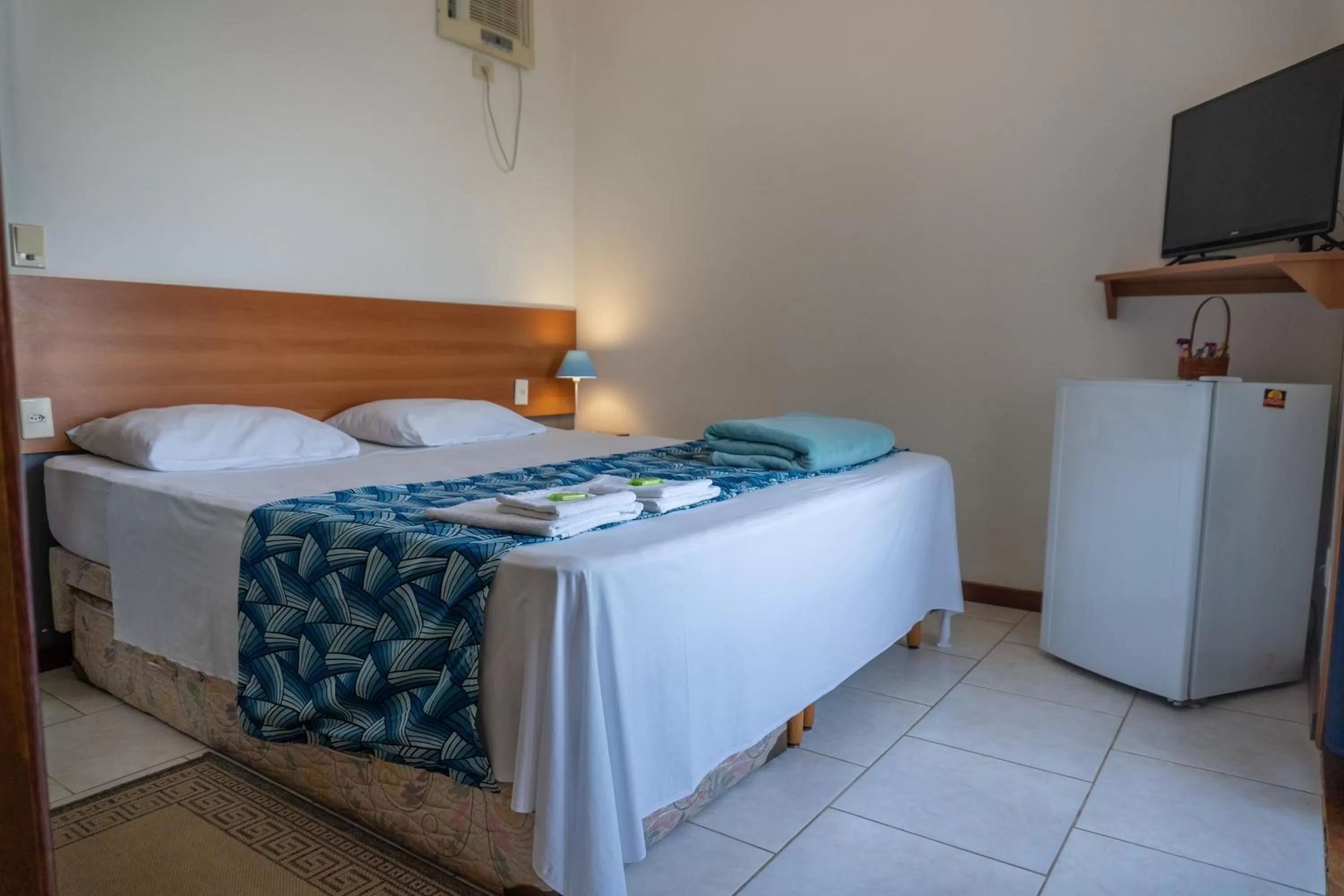 Bed in Pousada Piquara