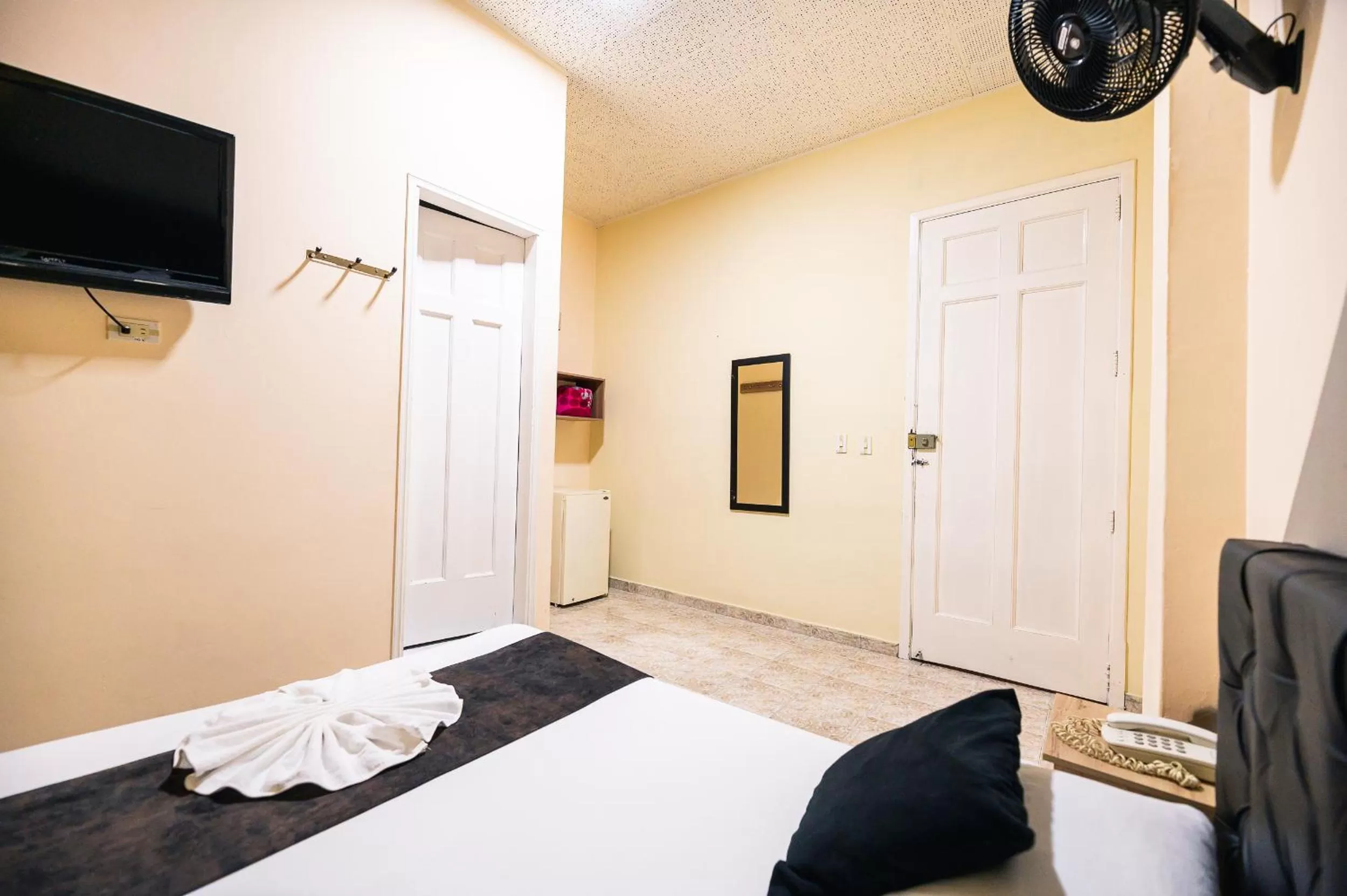 Bed in HOTEL CALLE REAL SUITE