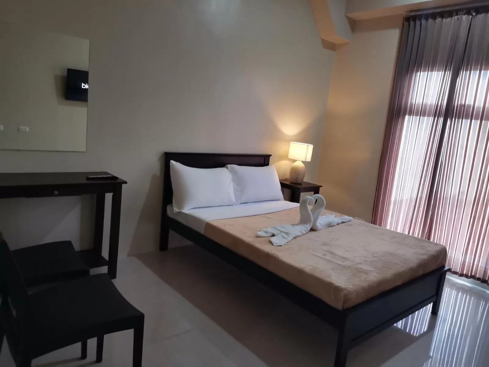 Photo of the whole room, Bed in G Square Residences