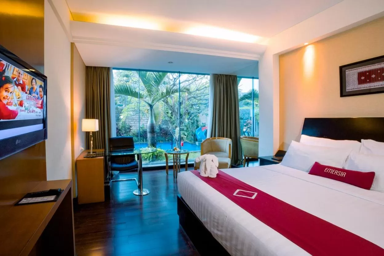 Bed in Emersia Hotel and Resort
