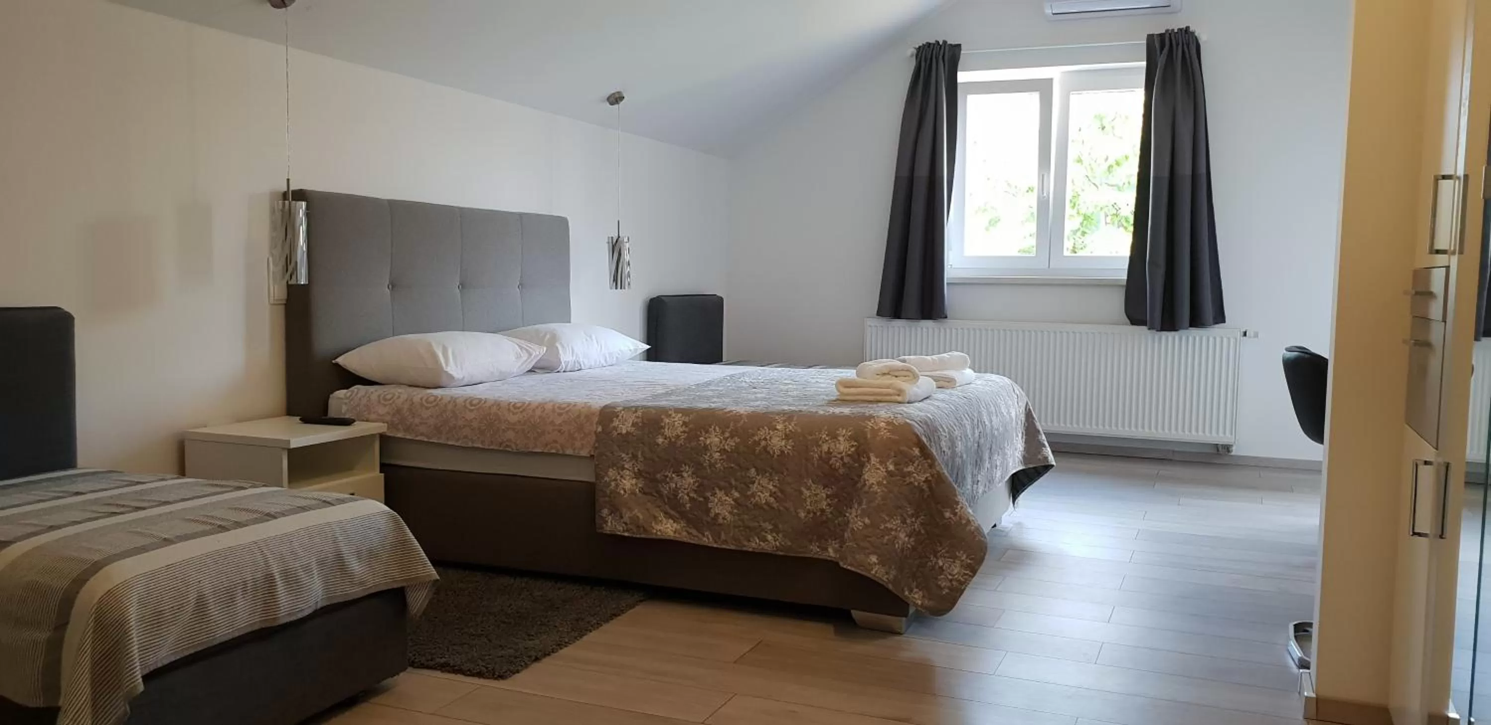 Bed in KE-TO Zagreb Airport Rooms