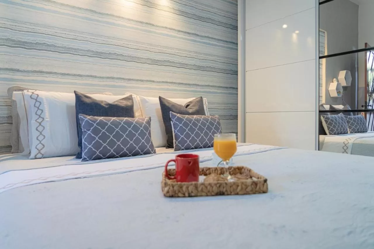 Bed in Pousada Recanto da Família