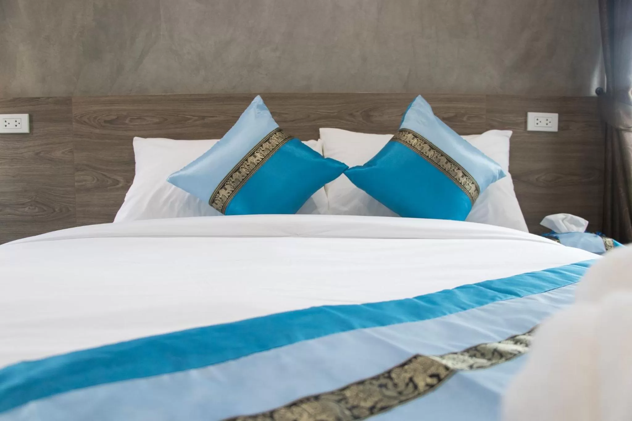 Bed in Puak Taem Boutique Hotel