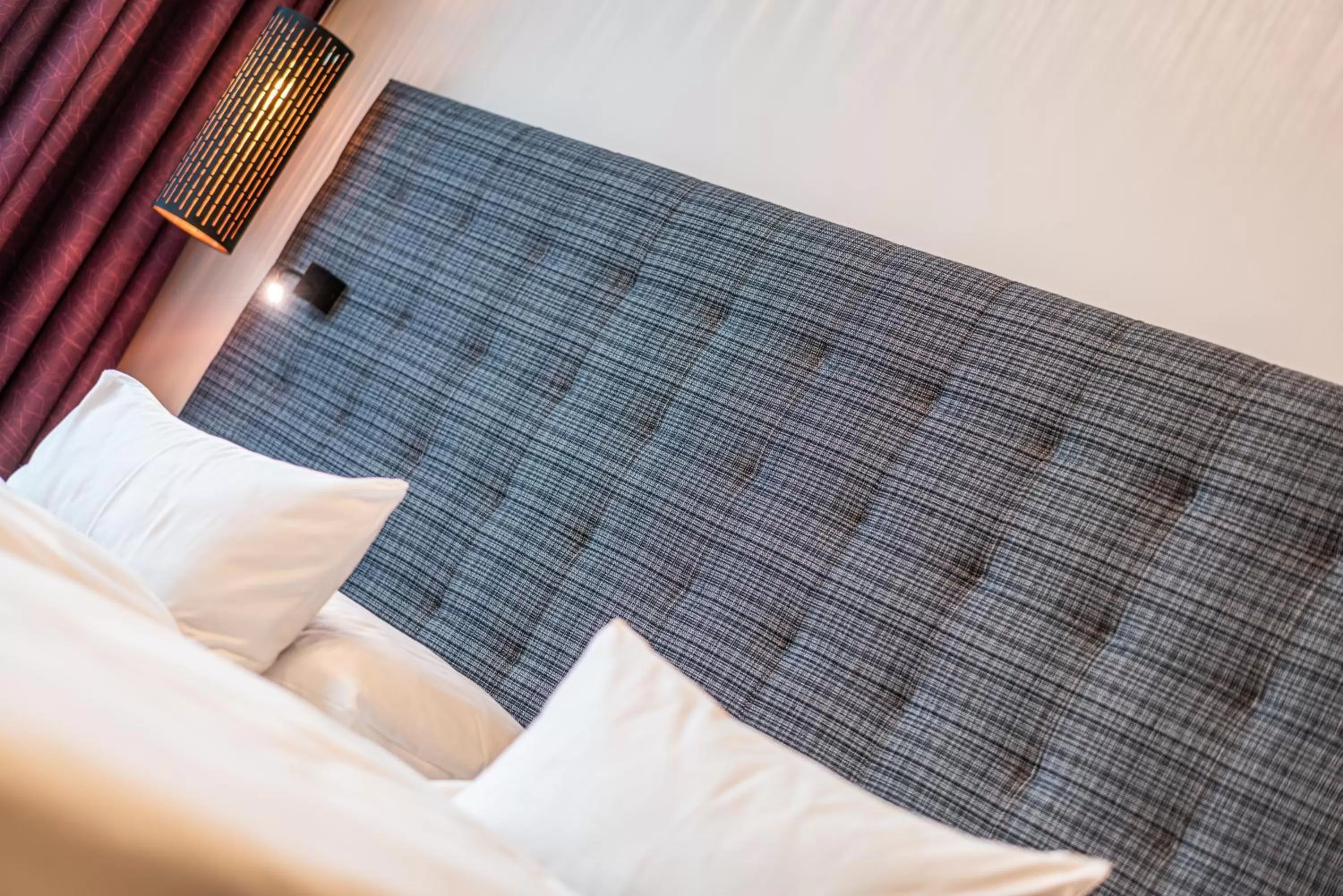 Bed in Rufi's Hotel Innsbruck