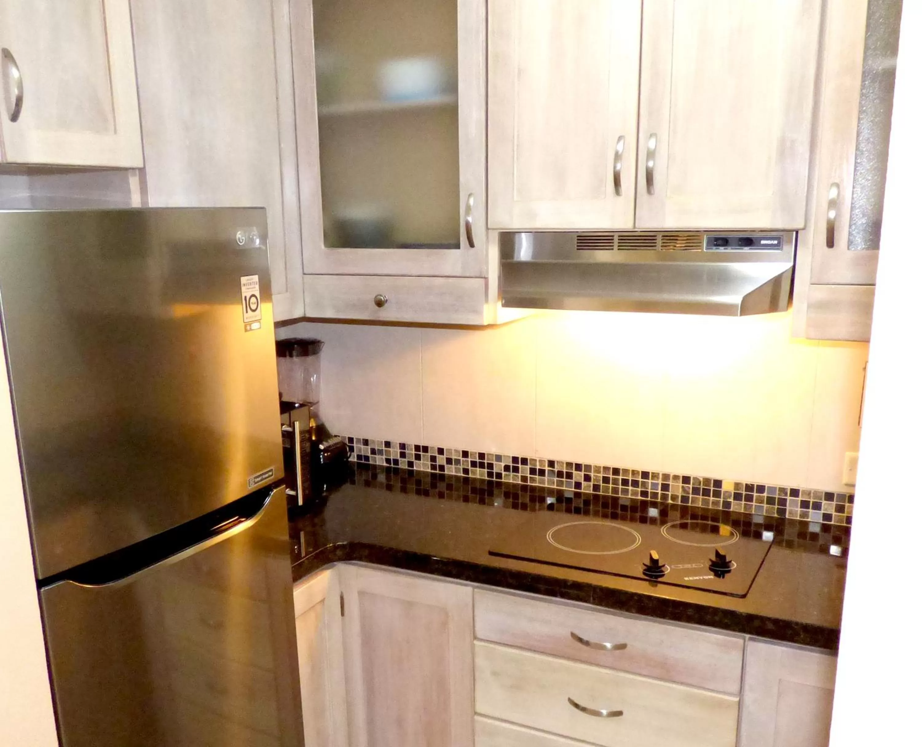 Kitchen or kitchenette in Beach One Bedroom Suite A22