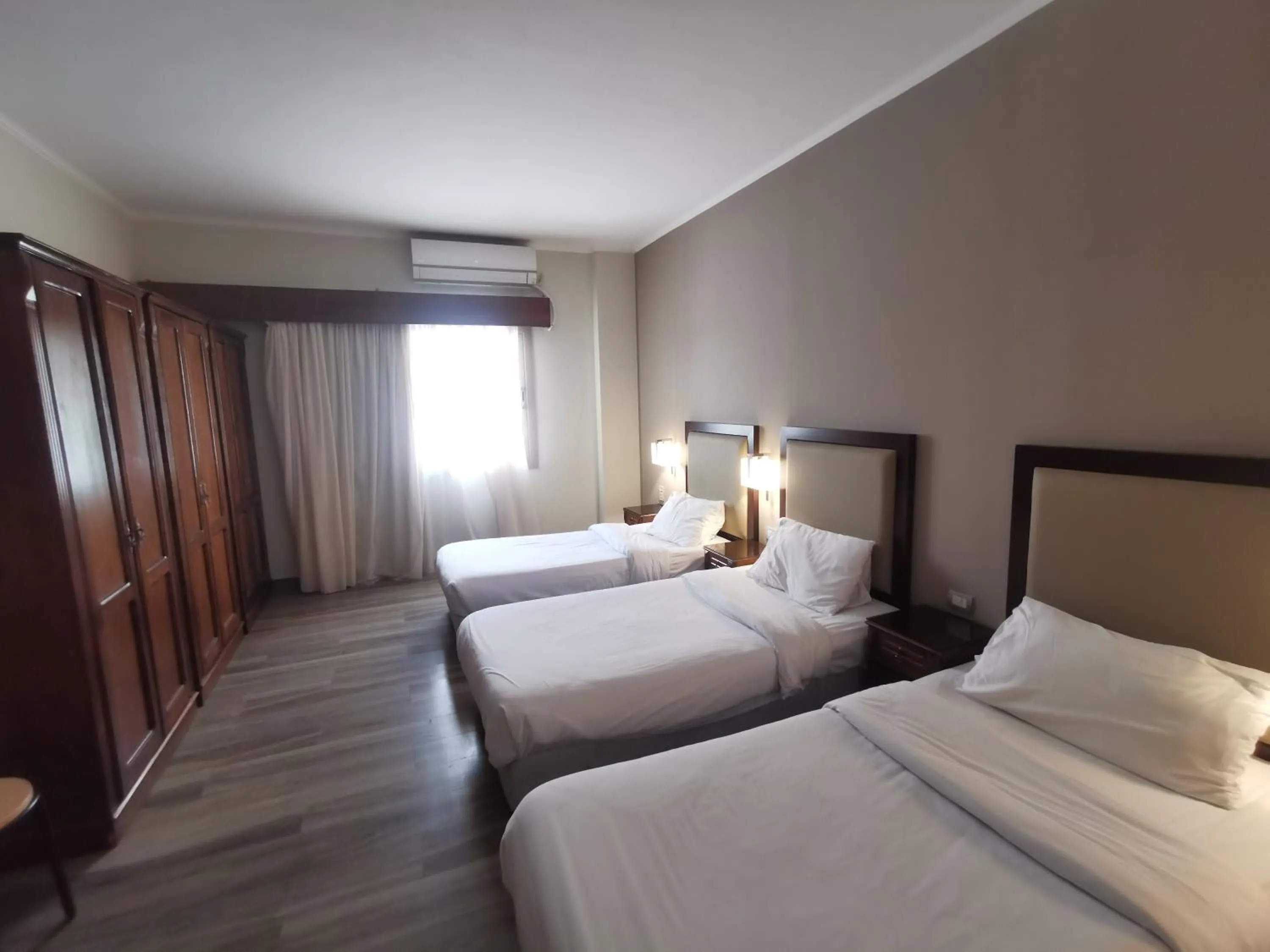 Photo of the whole room, Bed in Green Plaza Inn '''Business &Families Only'''