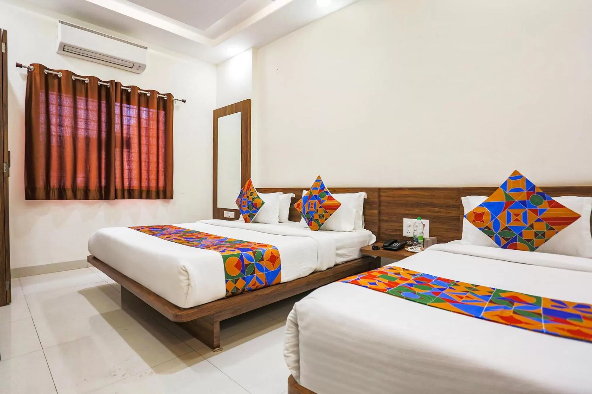 Bed in FabHotel Balaji Paradise