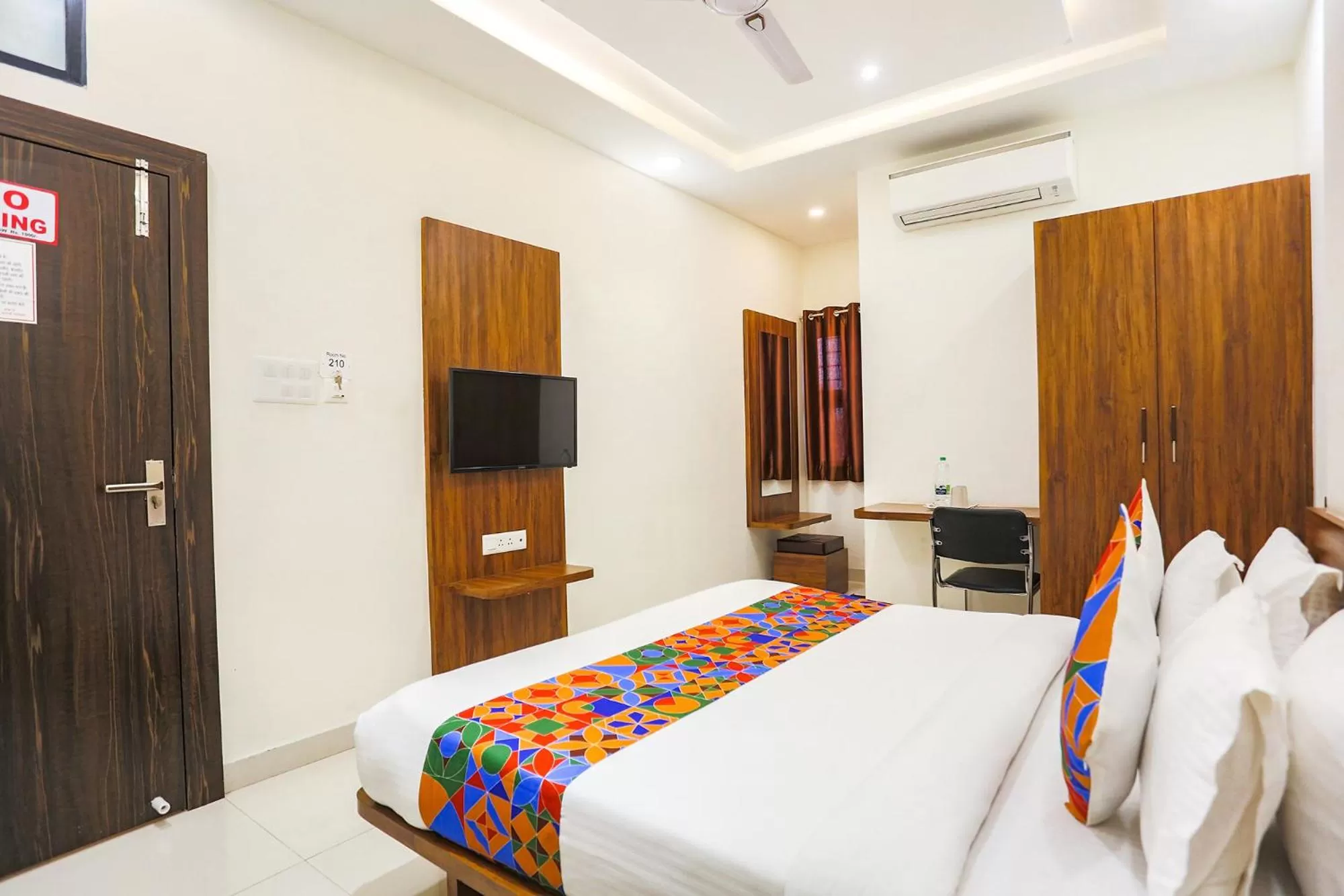 Bed in FabHotel Balaji Paradise