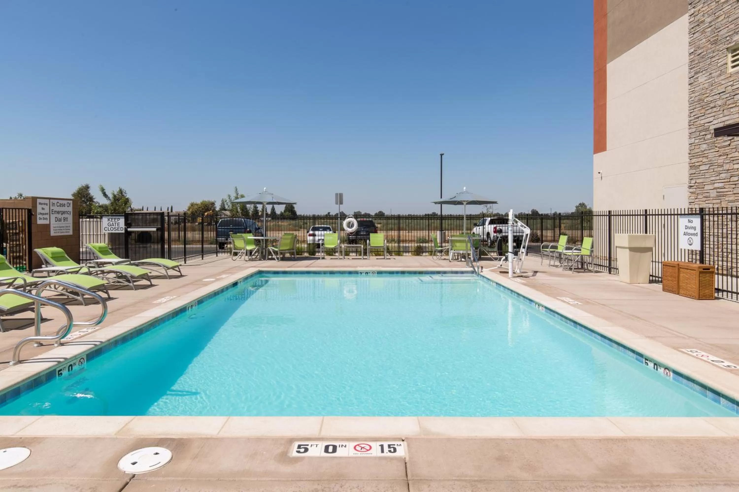 Swimming pool in Holiday Inn Express Visalia-Sequoia Gateway Area by IHG