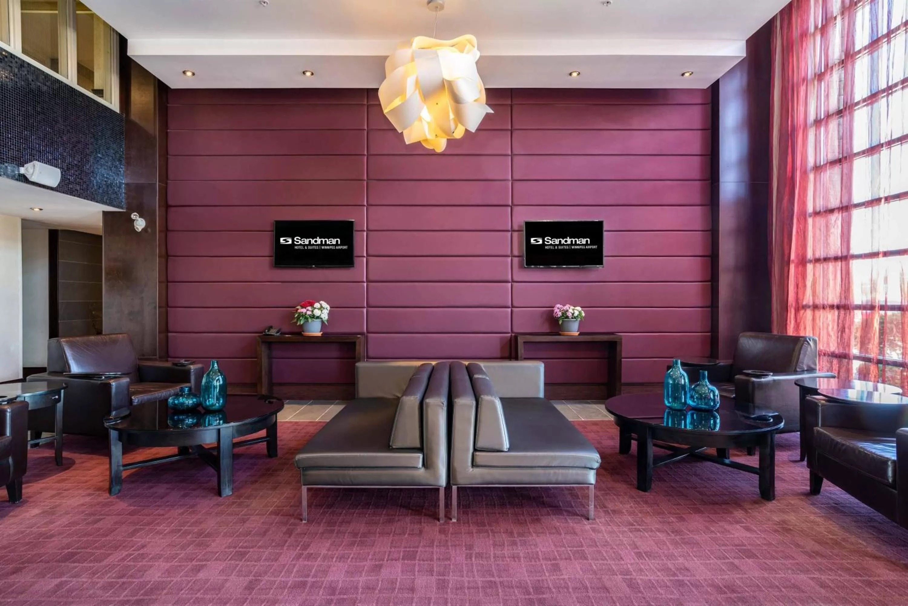Lobby or reception in Sandman Hotel & Suites Winnipeg Airport