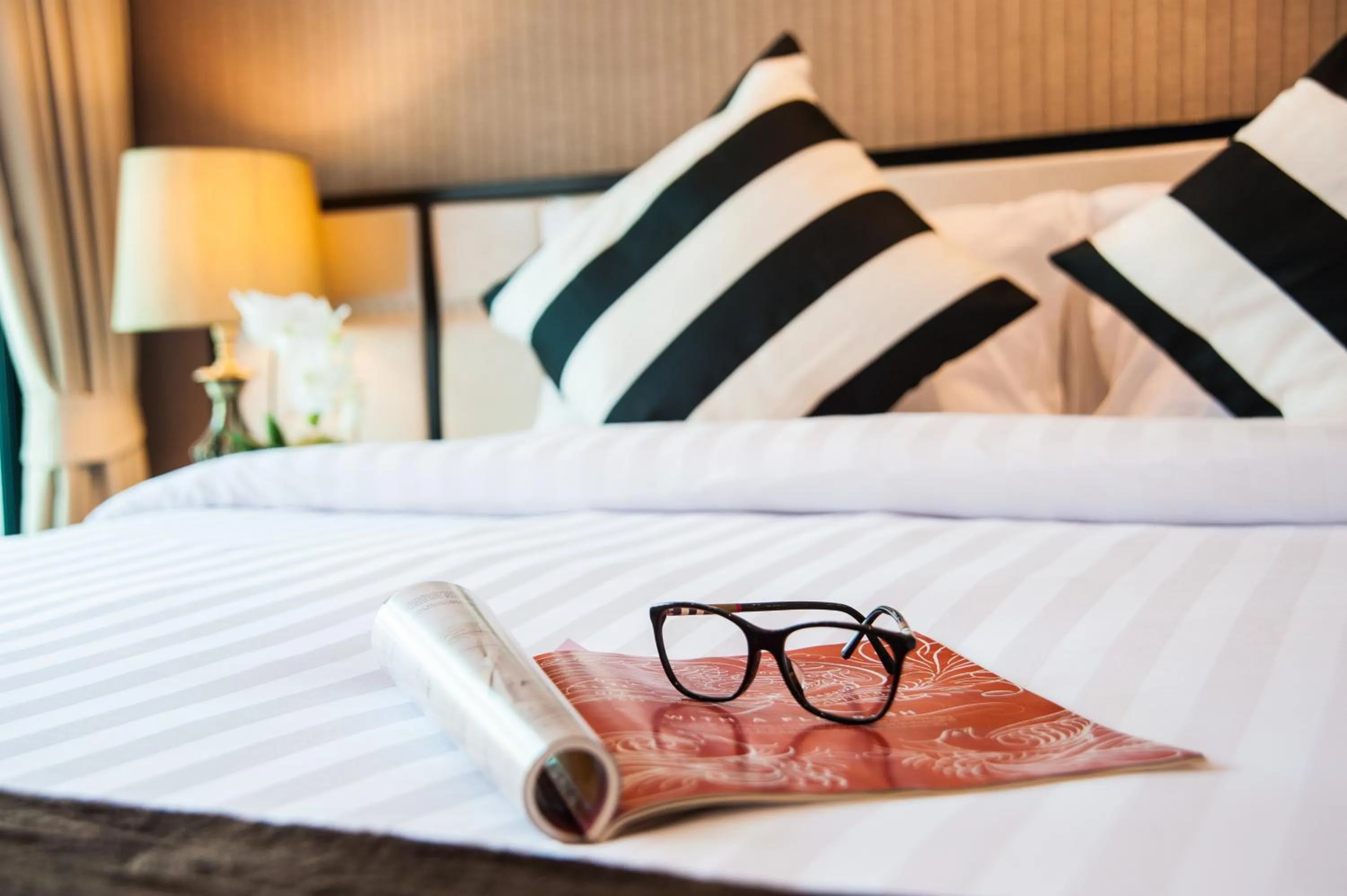 Bed in The Title KR Beach Condotel Rawai Beach