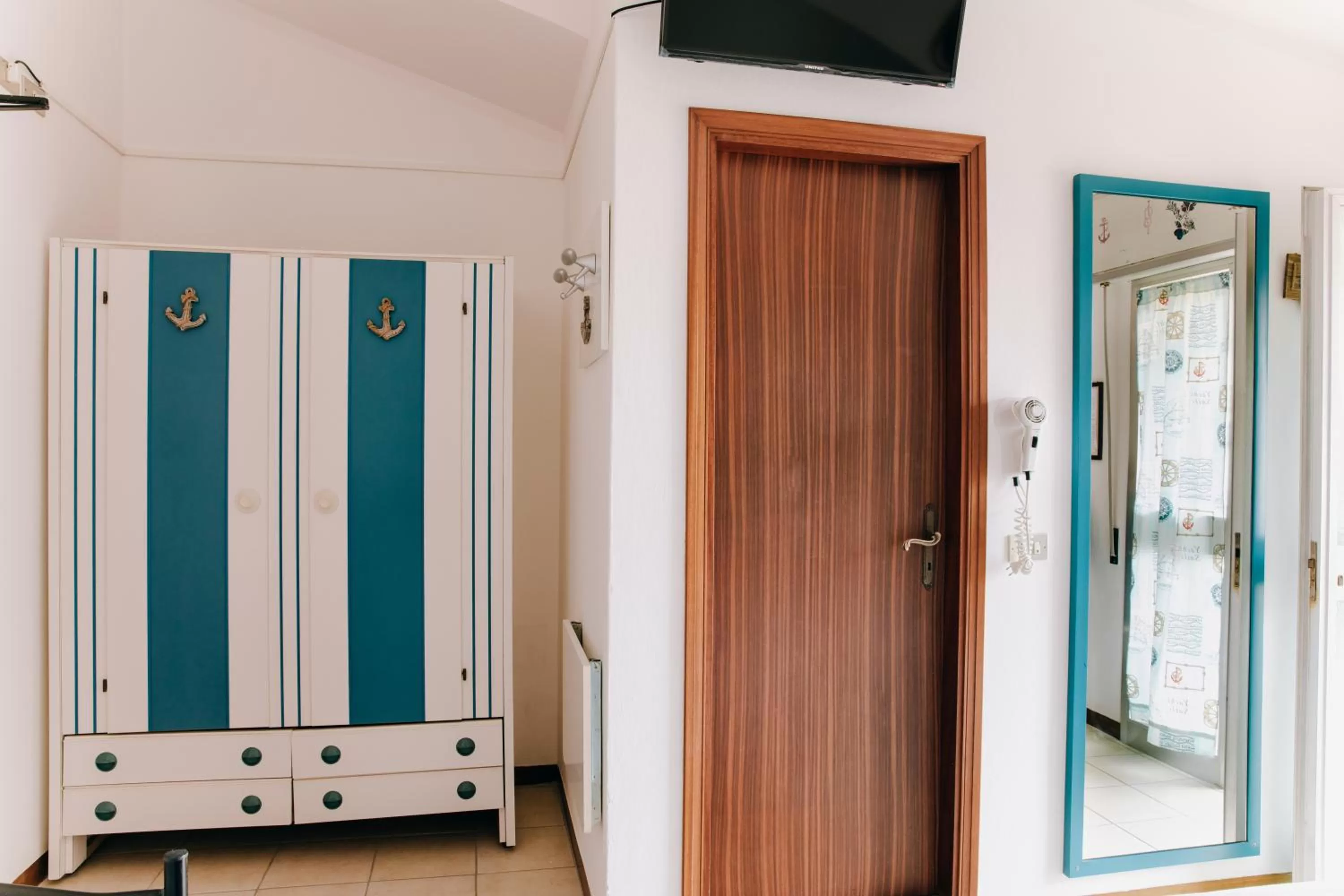 TV and multimedia in Hotel Villa Claudia