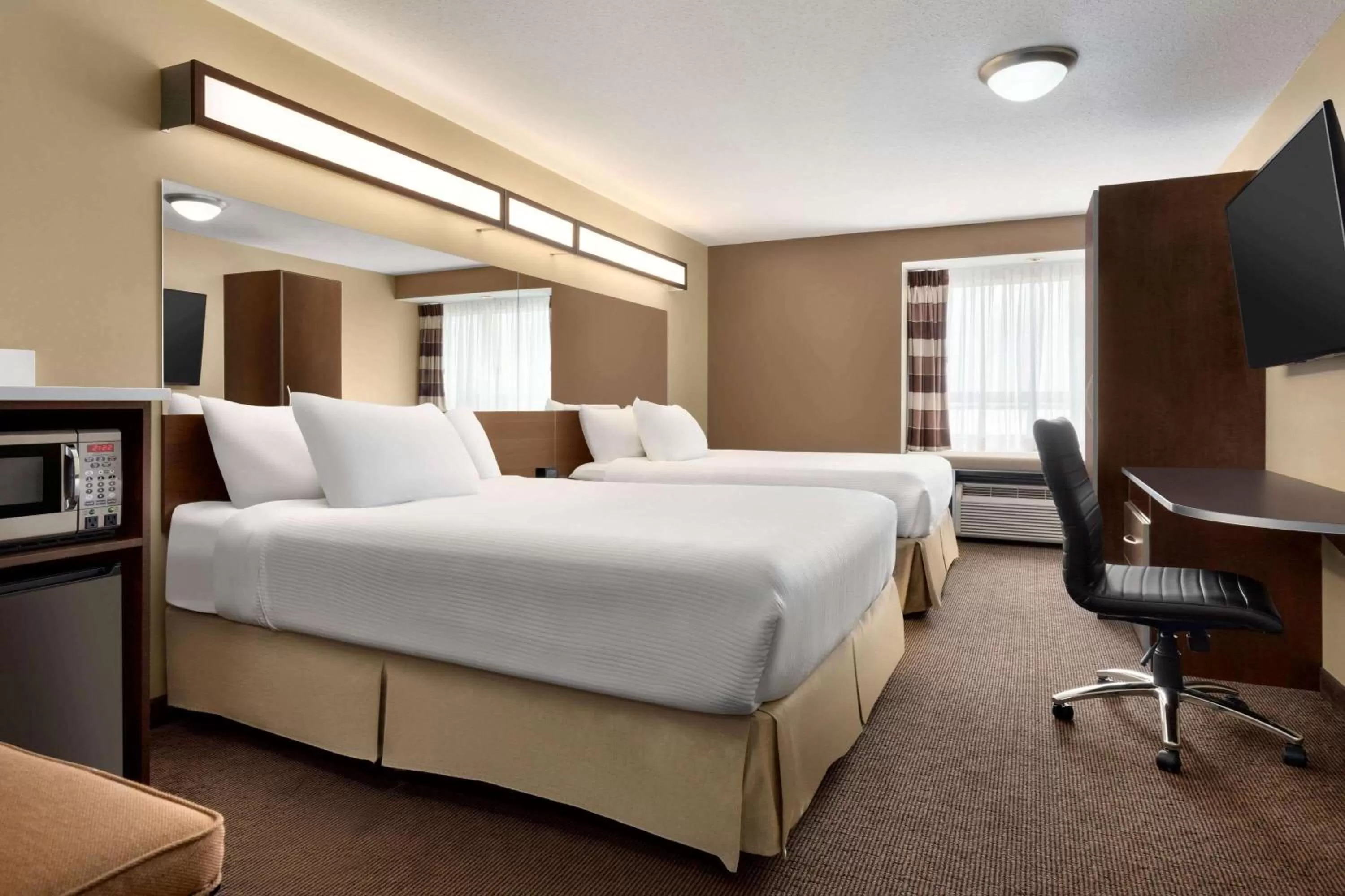 Photo of the whole room, Bed in Microtel Inn & Suites by Wyndham Estevan