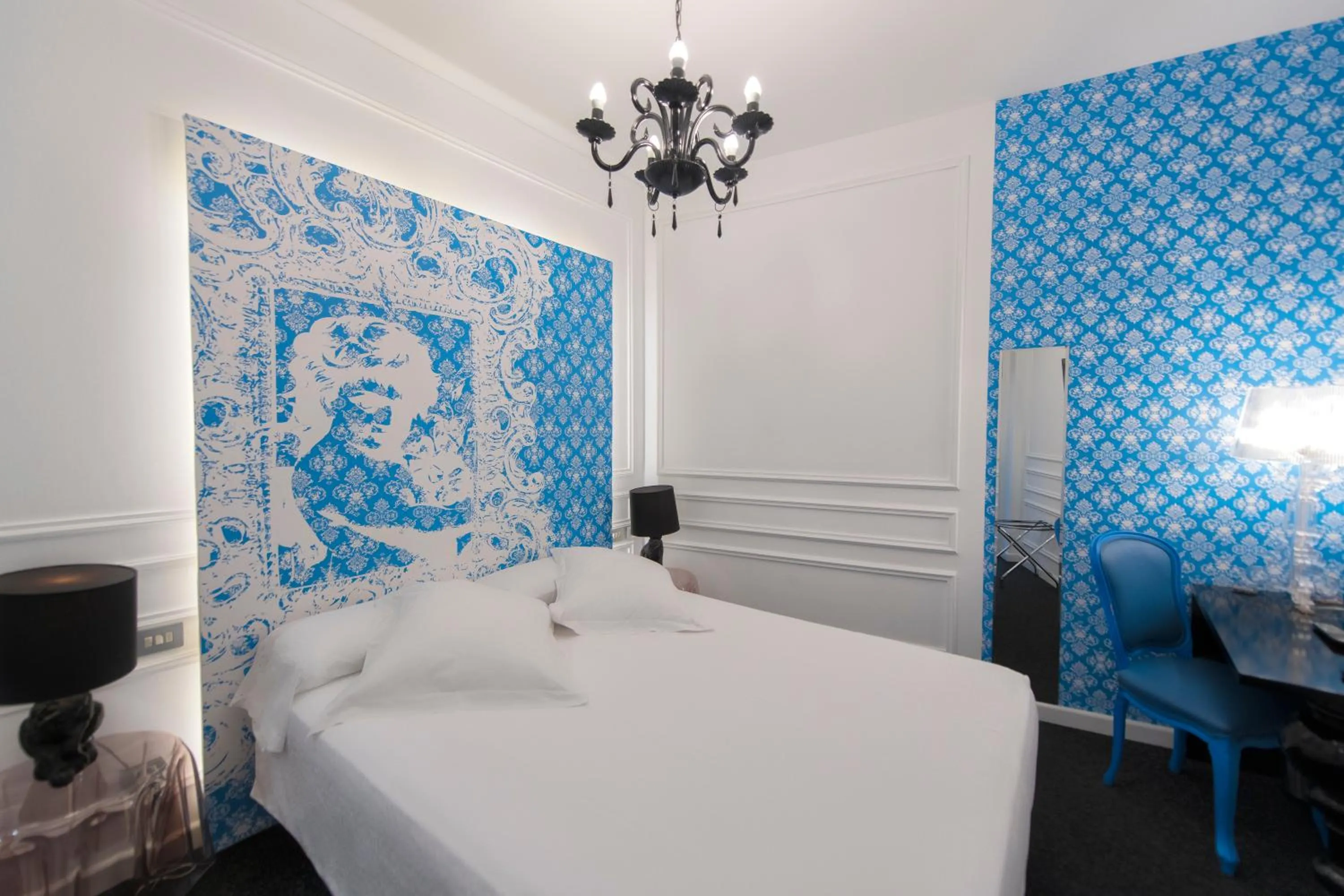 Bed in Posada del Dragón Boutique Hotel