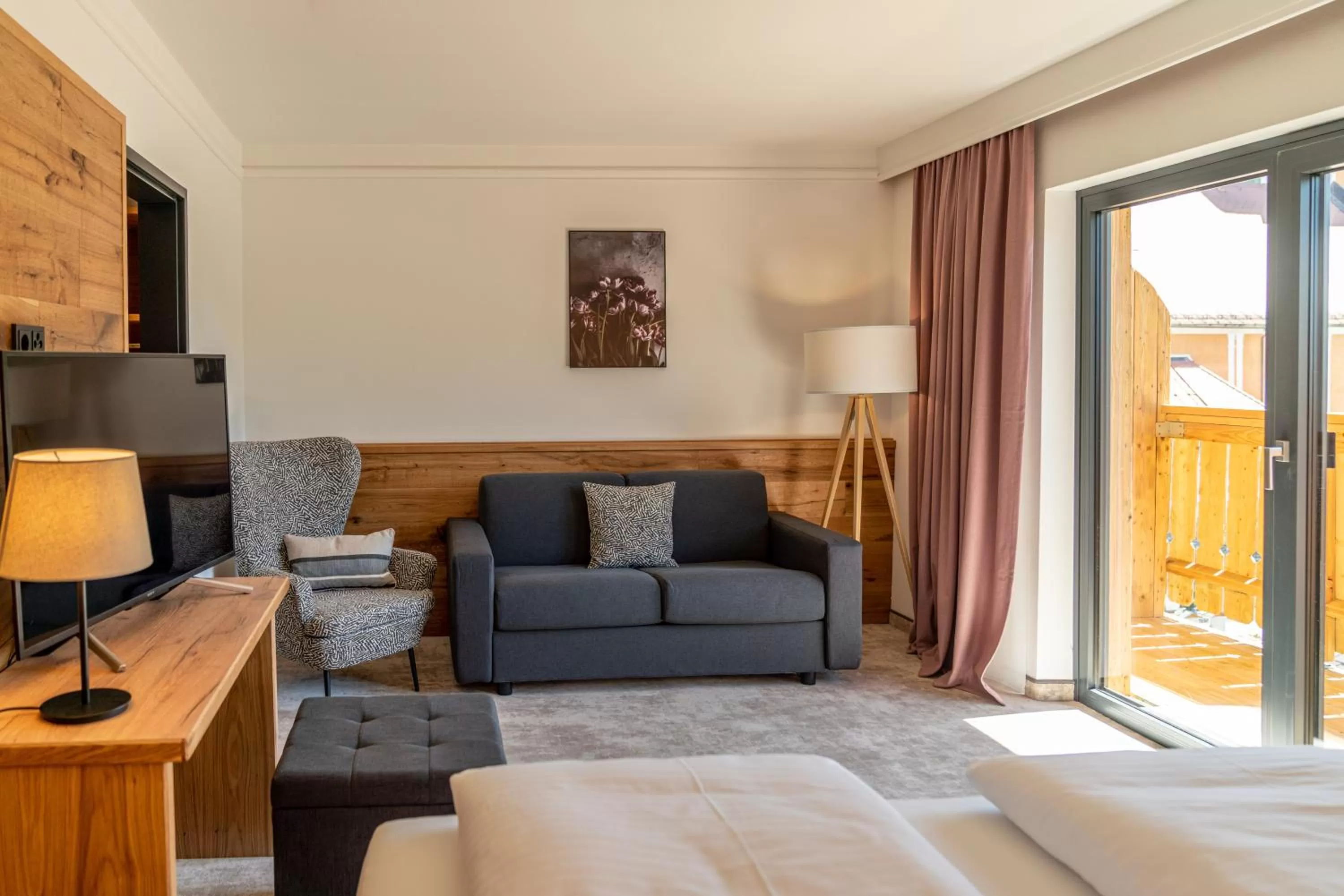 Seating area, Bed in Stadtvilla Schladming Boutiquehotel