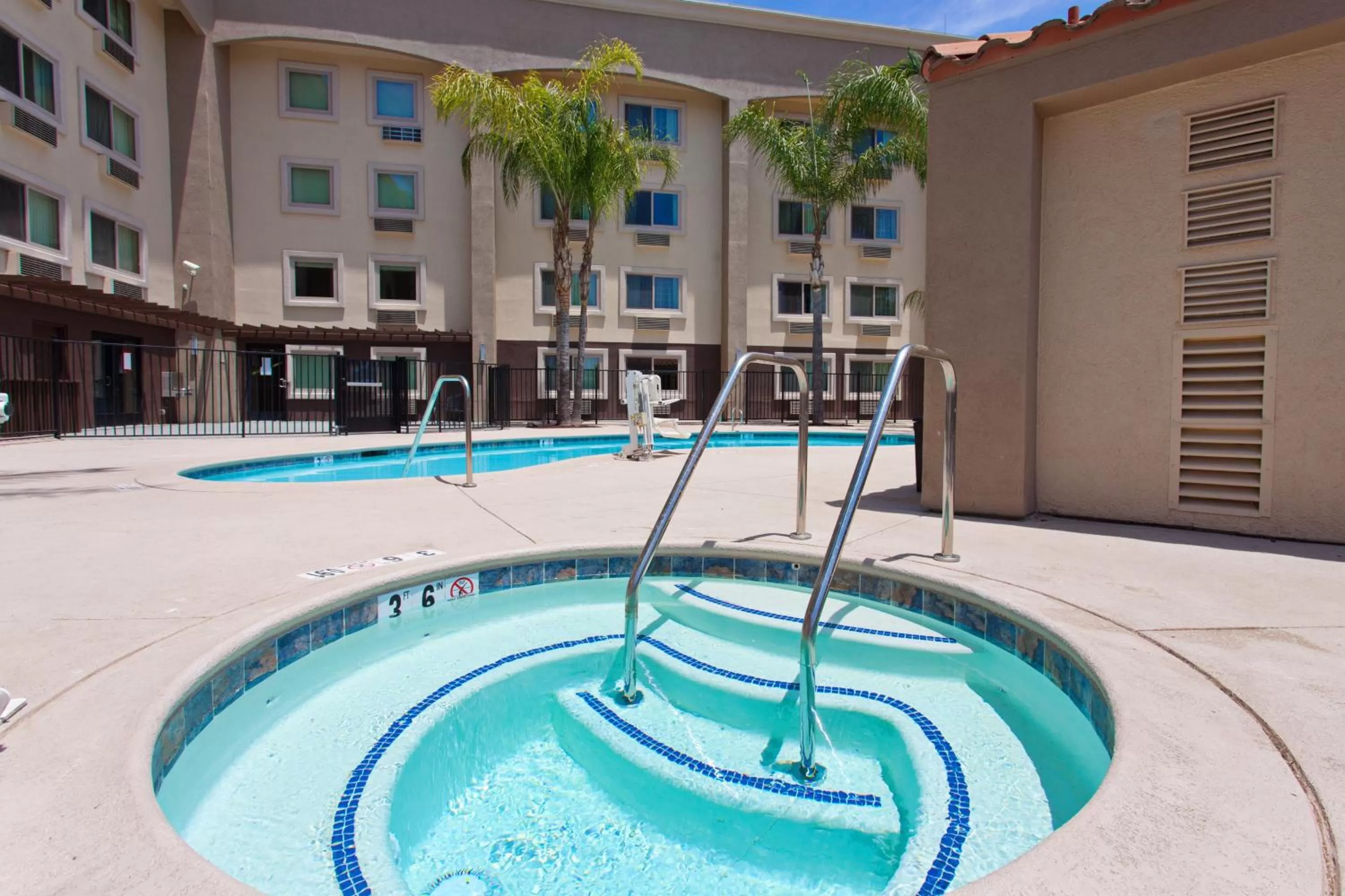 Swimming pool in Holiday Inn Express San Bernardino Colton by IHG