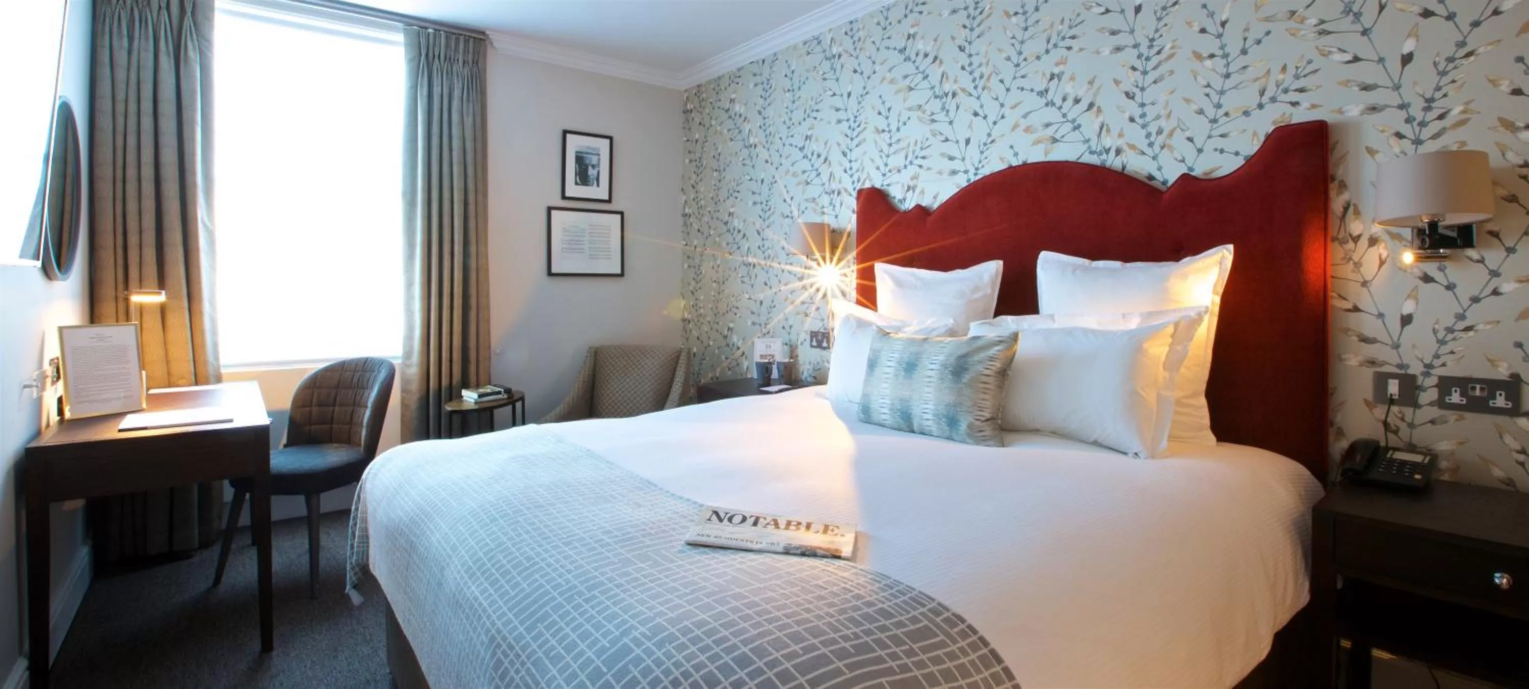 Bed in 54 Queen's Gate Hotel