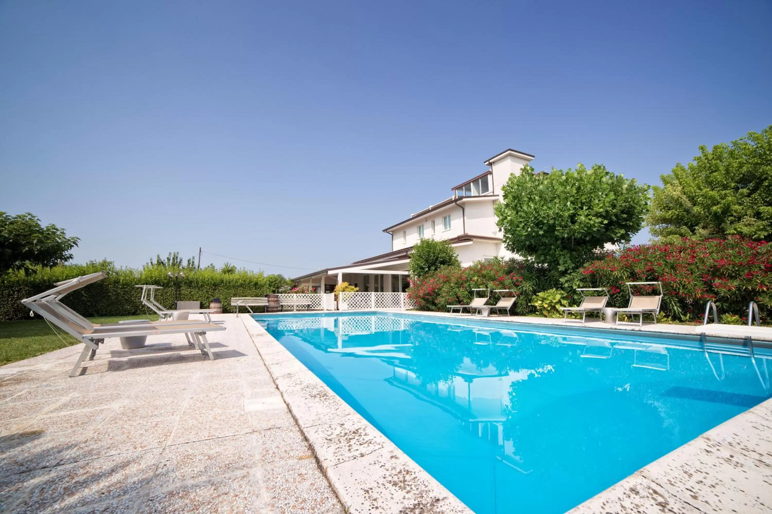 Pool view in Hotel Country House La Radice