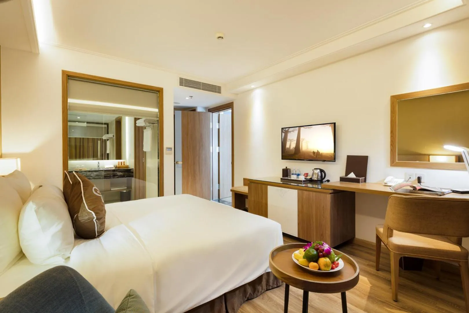 Photo of the whole room, Bed in Comodo Nha Trang Hotel