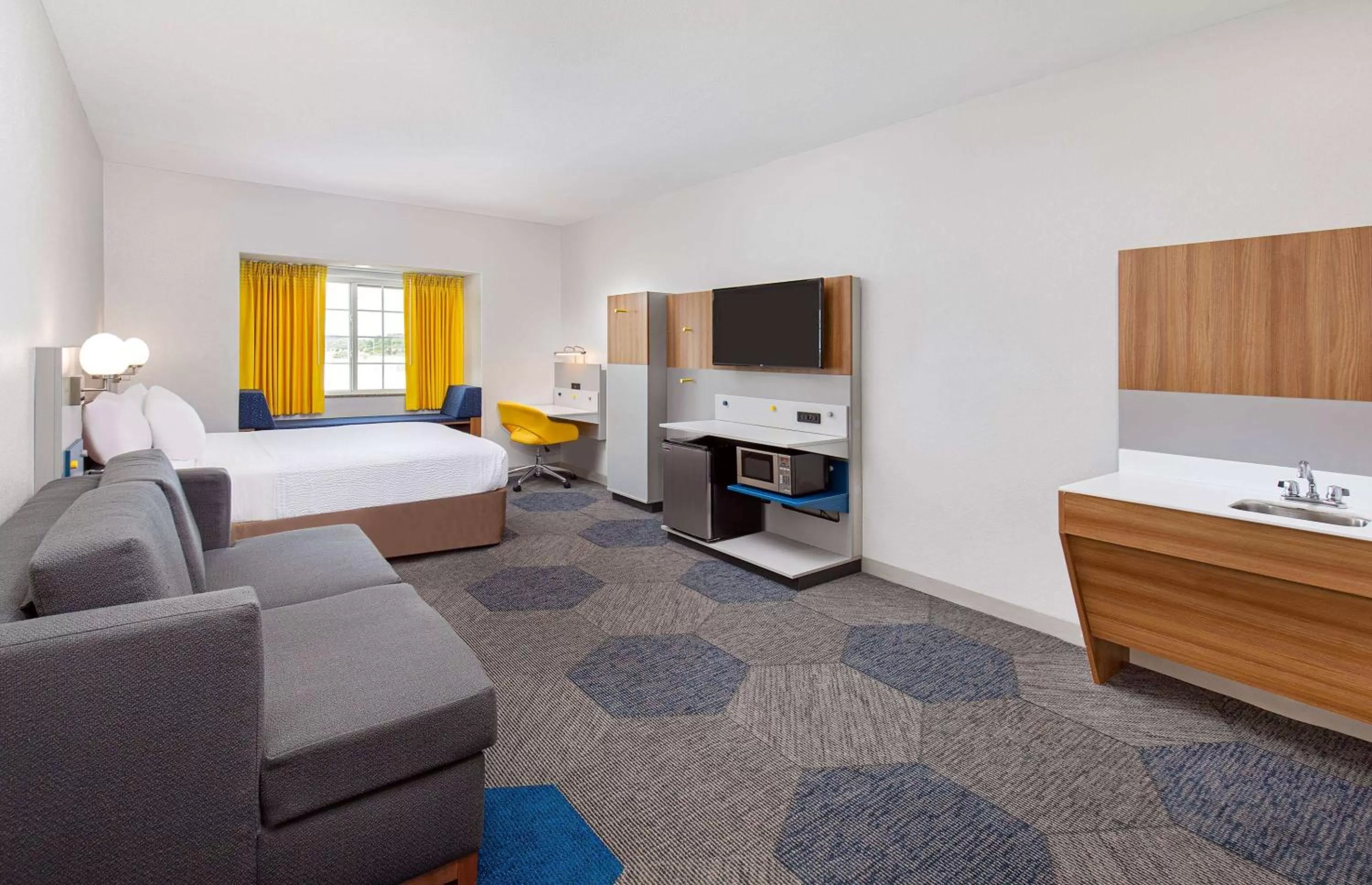 Bed in Microtel Inn and Suites by Wyndham