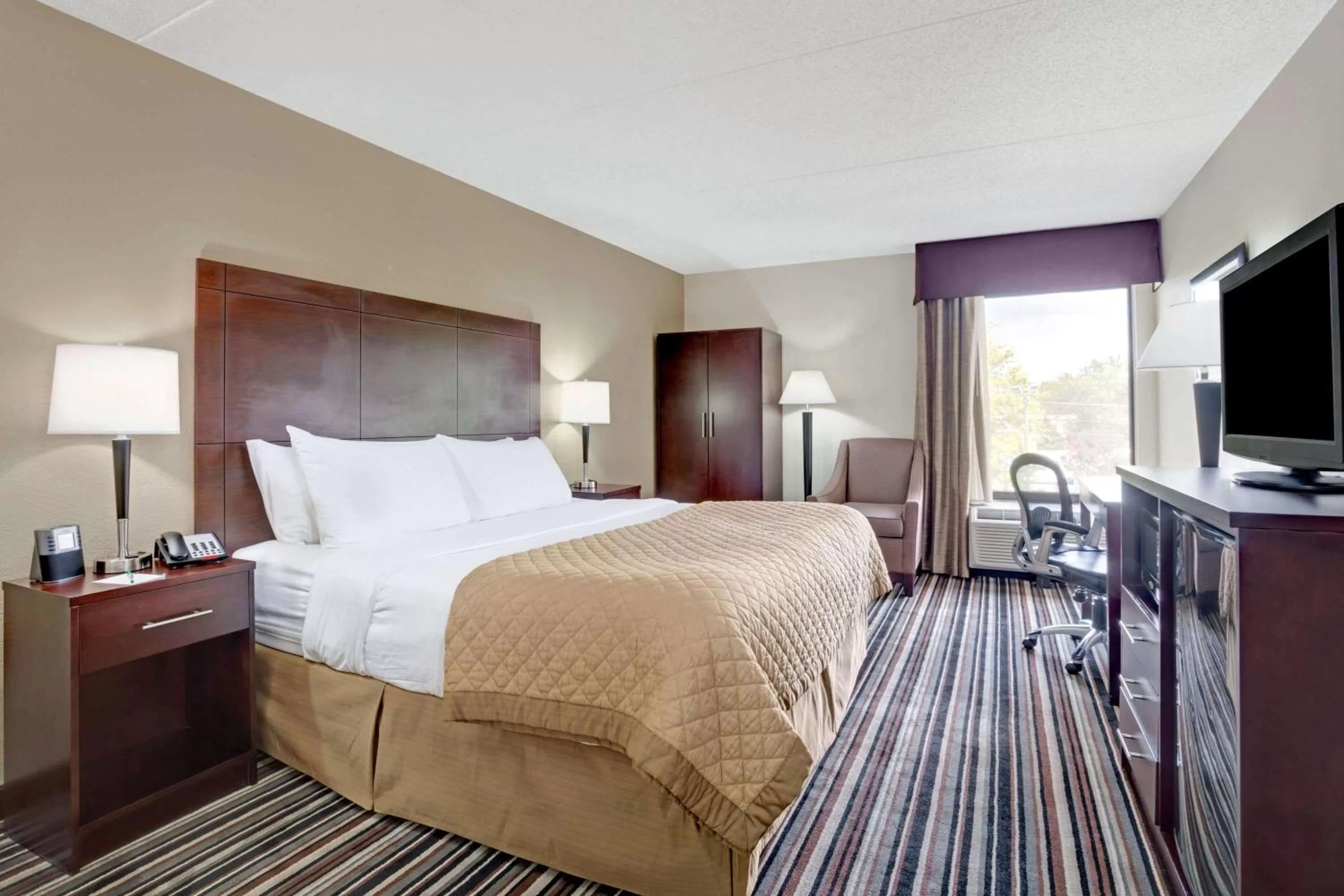 Photo of the whole room, Bed in Wyndham Garden Charlotte Airport Southeast