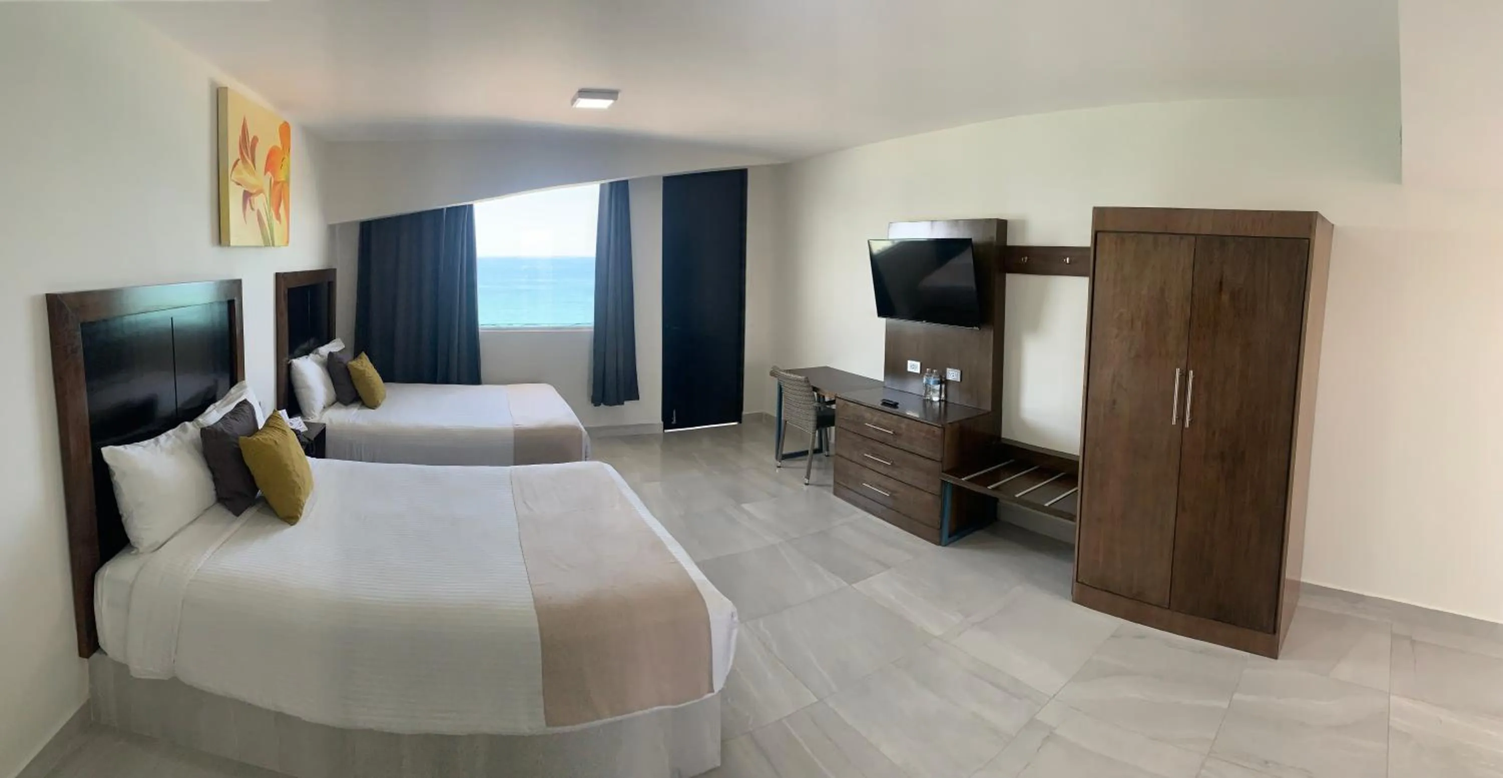 Photo of the whole room, Bed in Hacienda Mazatlán sea view