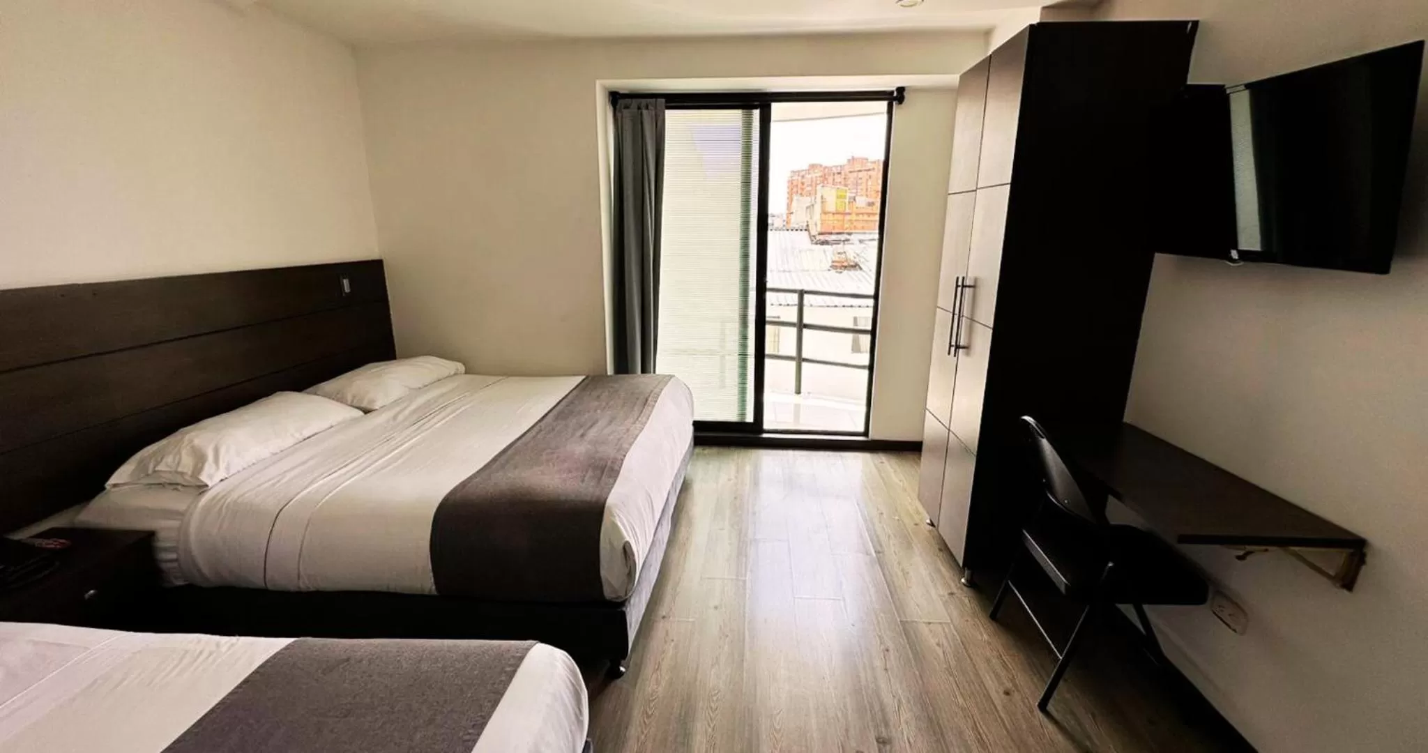 Bed in Hotel Expo Hotel Ferial