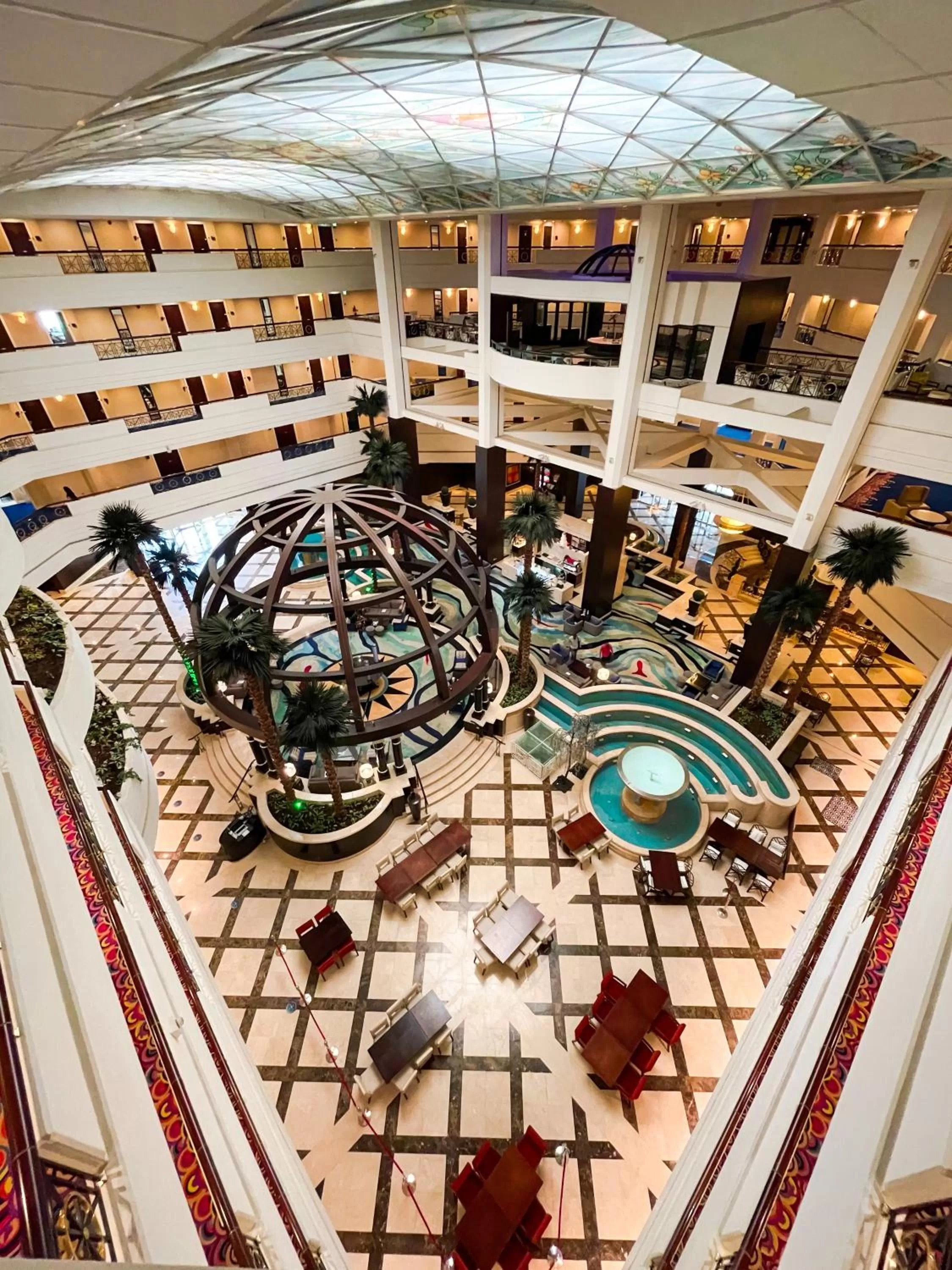 Lobby or reception in Mövenpick Grand Al Bustan