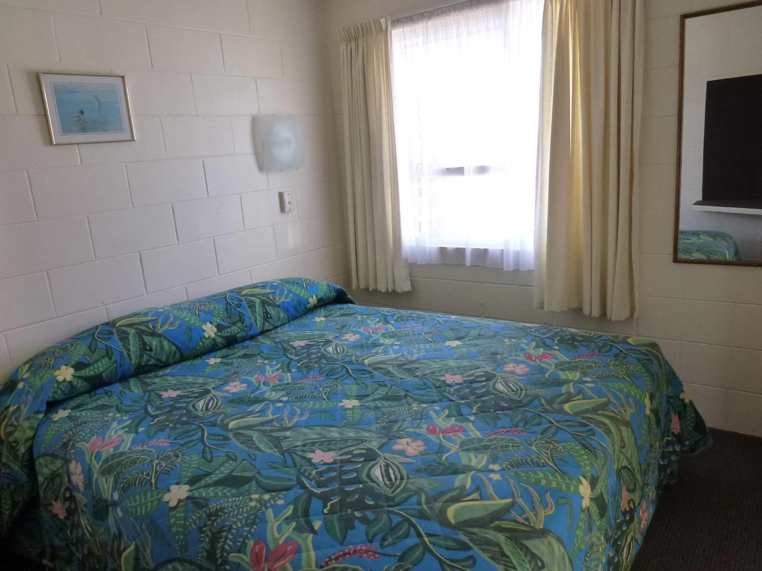 Bed in Mana-Nui Motel