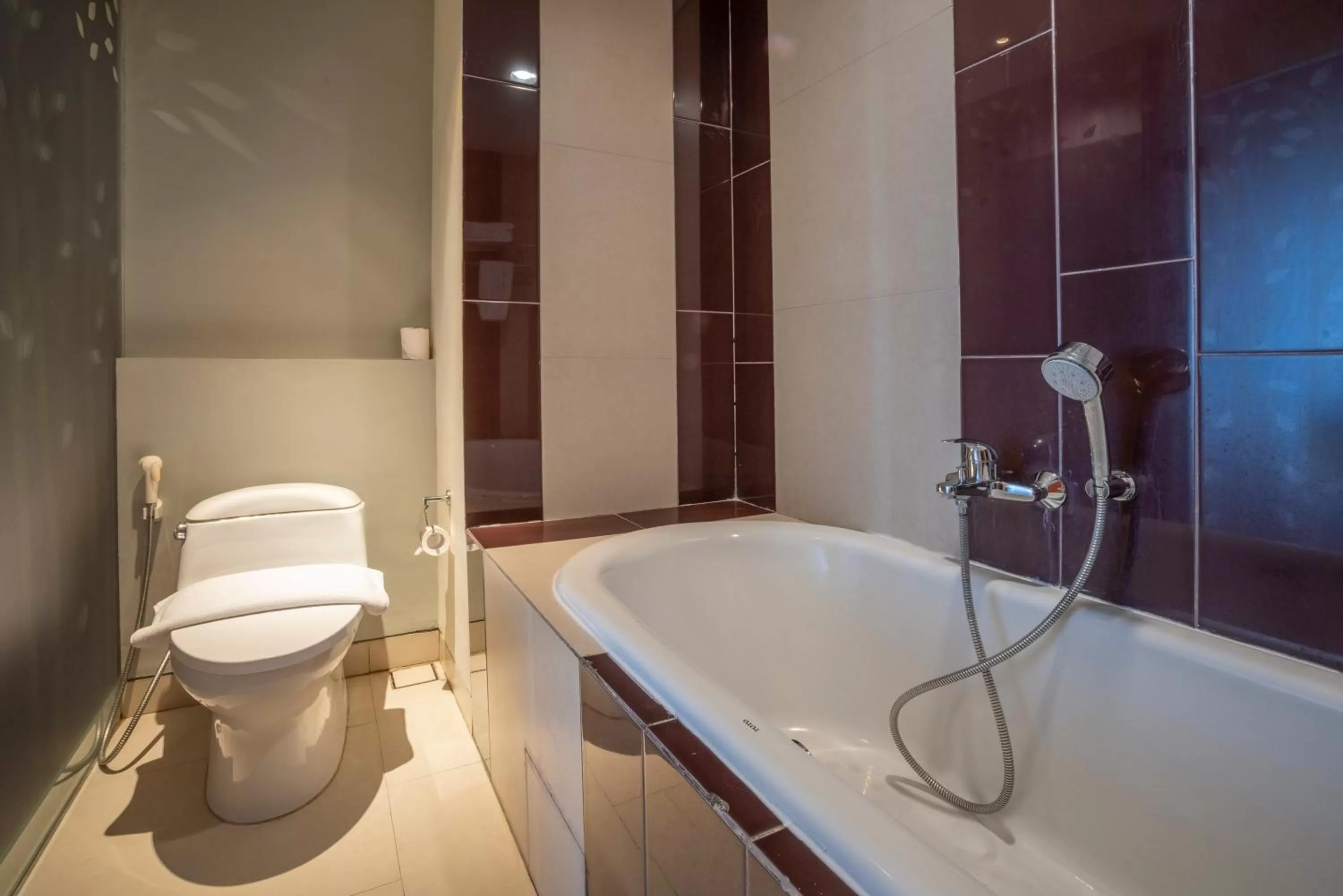 Bathroom in Grand Livio Kuta Hotel