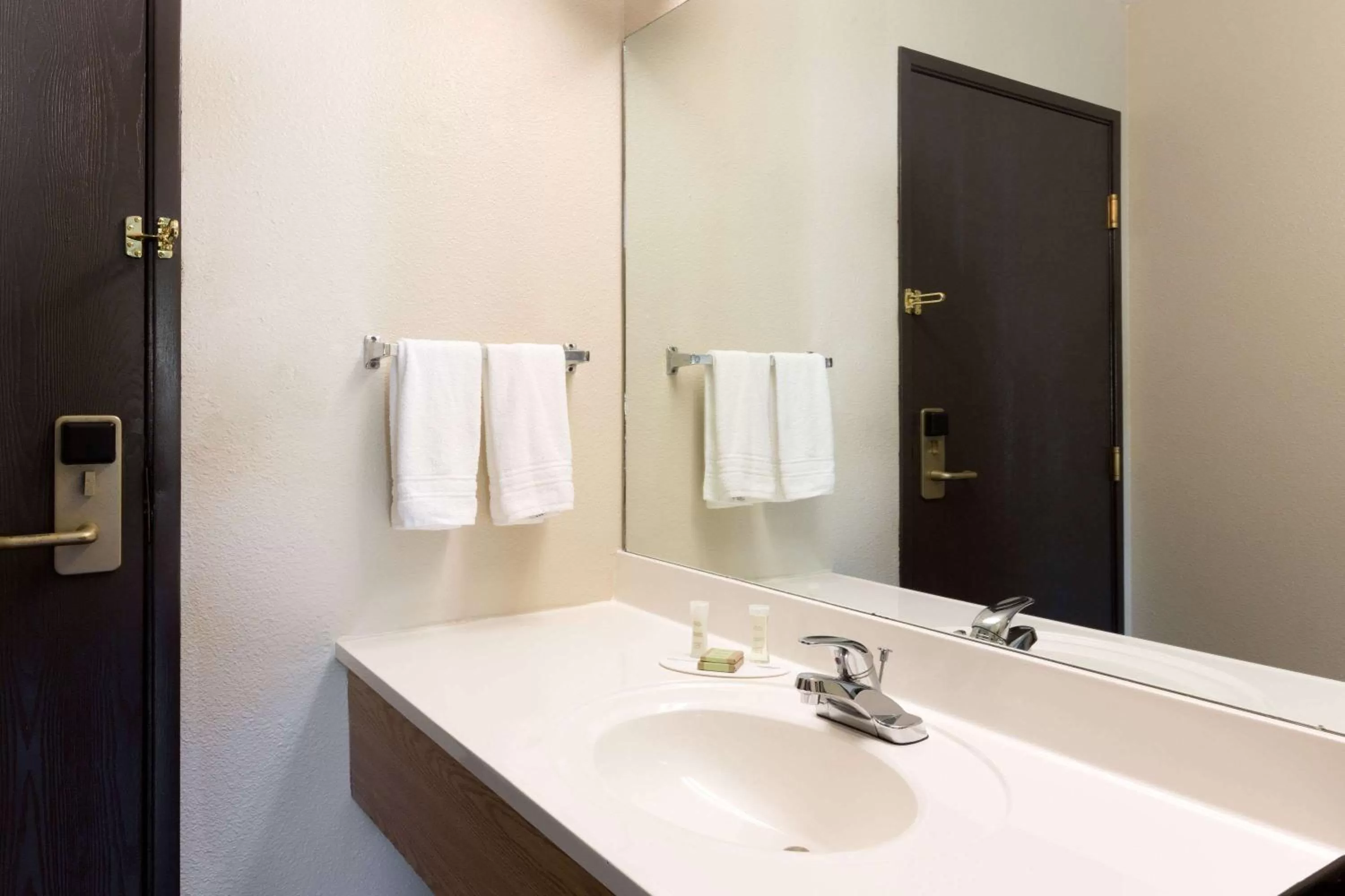 Bathroom in Super 8 by Wyndham Radcliff Ft. Knox Area
