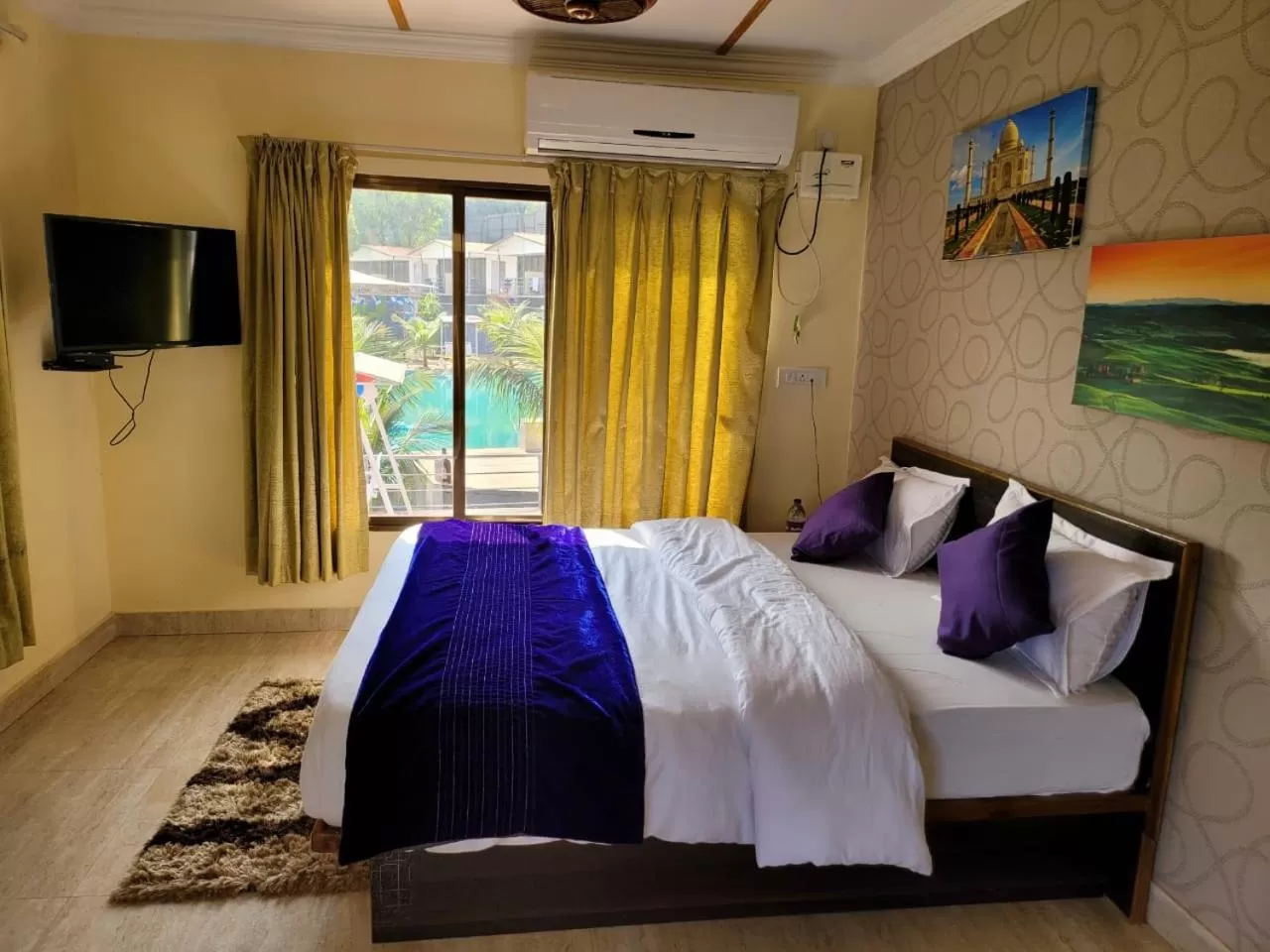 Bed in THE NIHAL RESORT