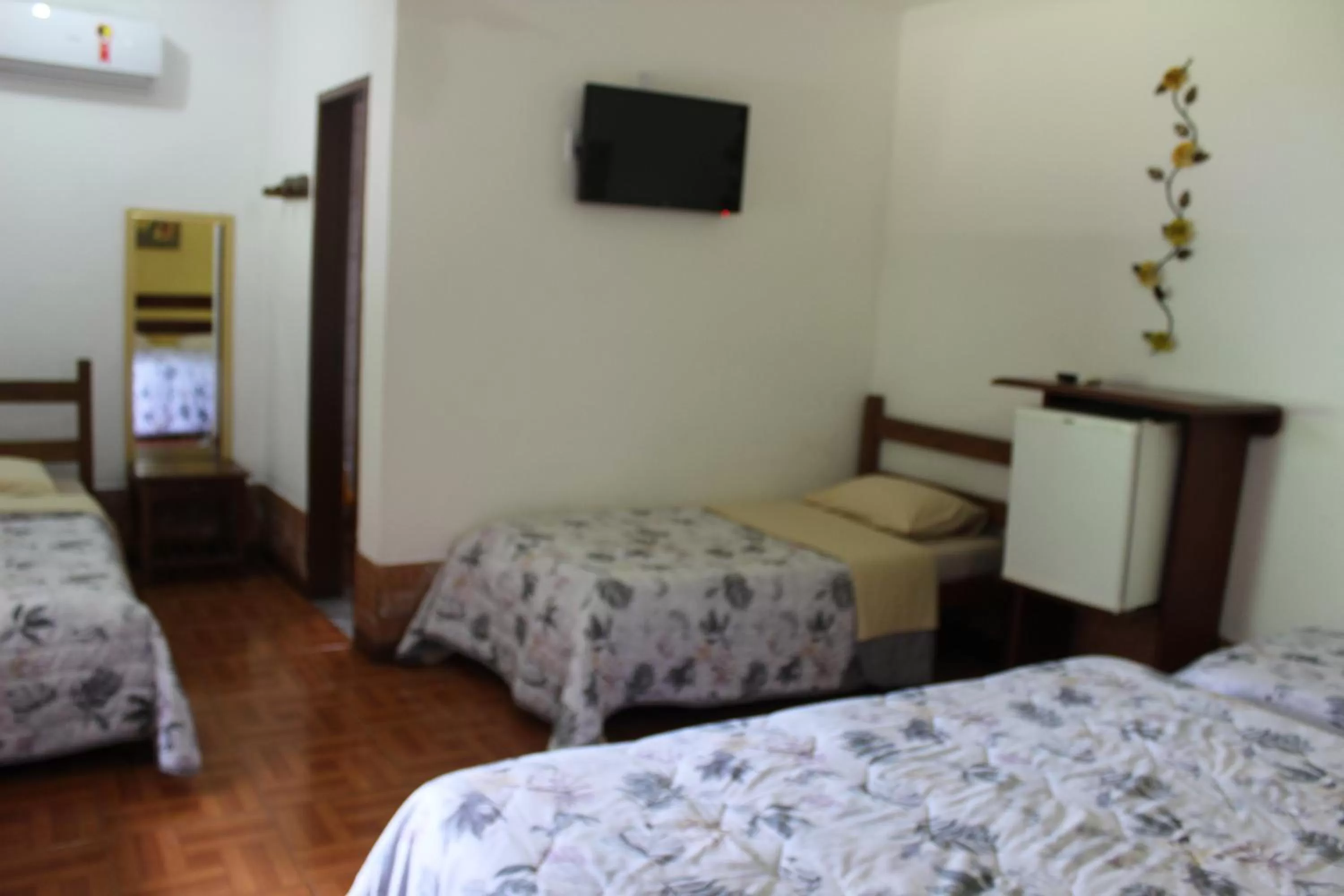 Bed in Pousada Flor de Paraty