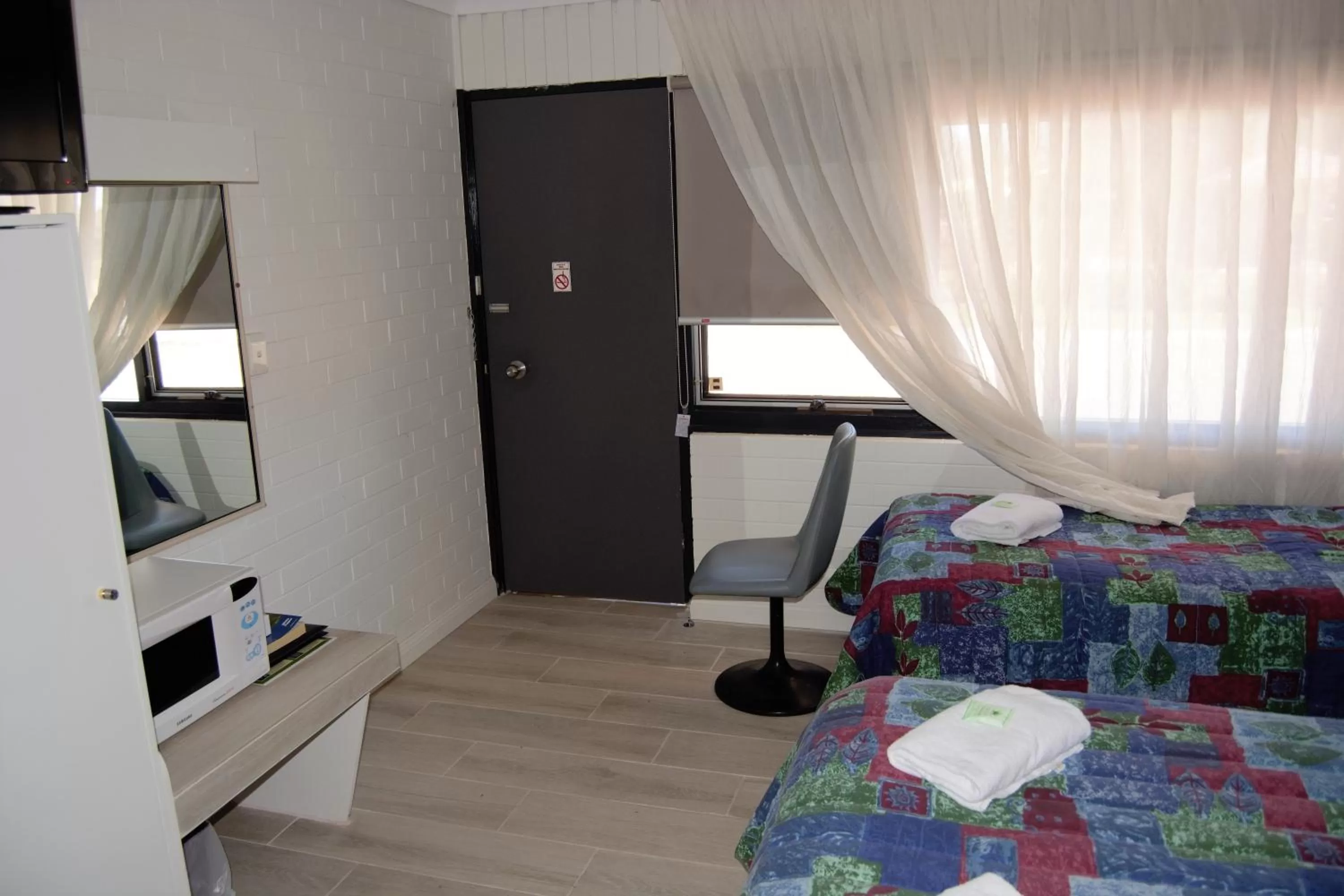 Bed in Civic Motor Inn